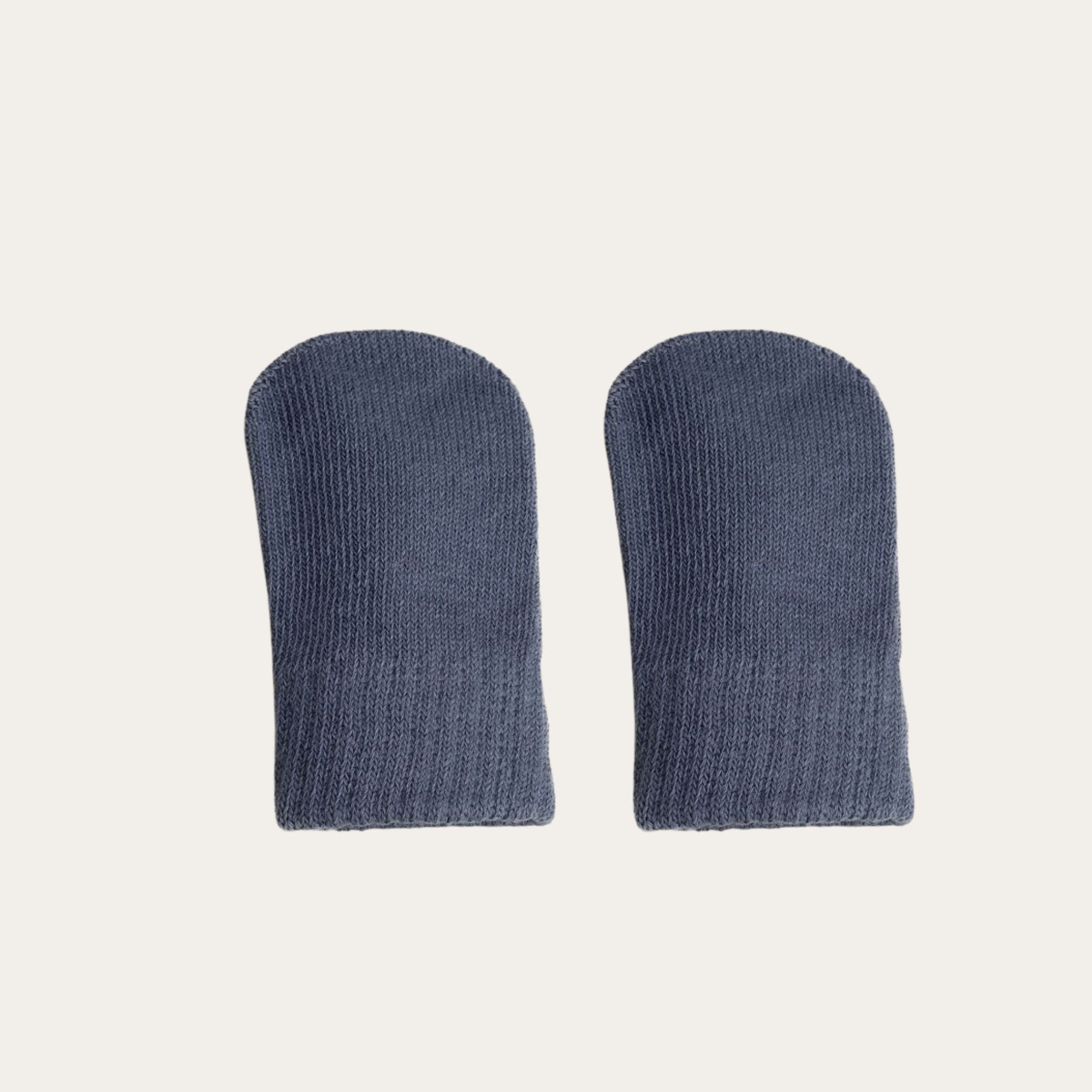 A pair of 100% brushed cotton mittens in a soft dusty blue