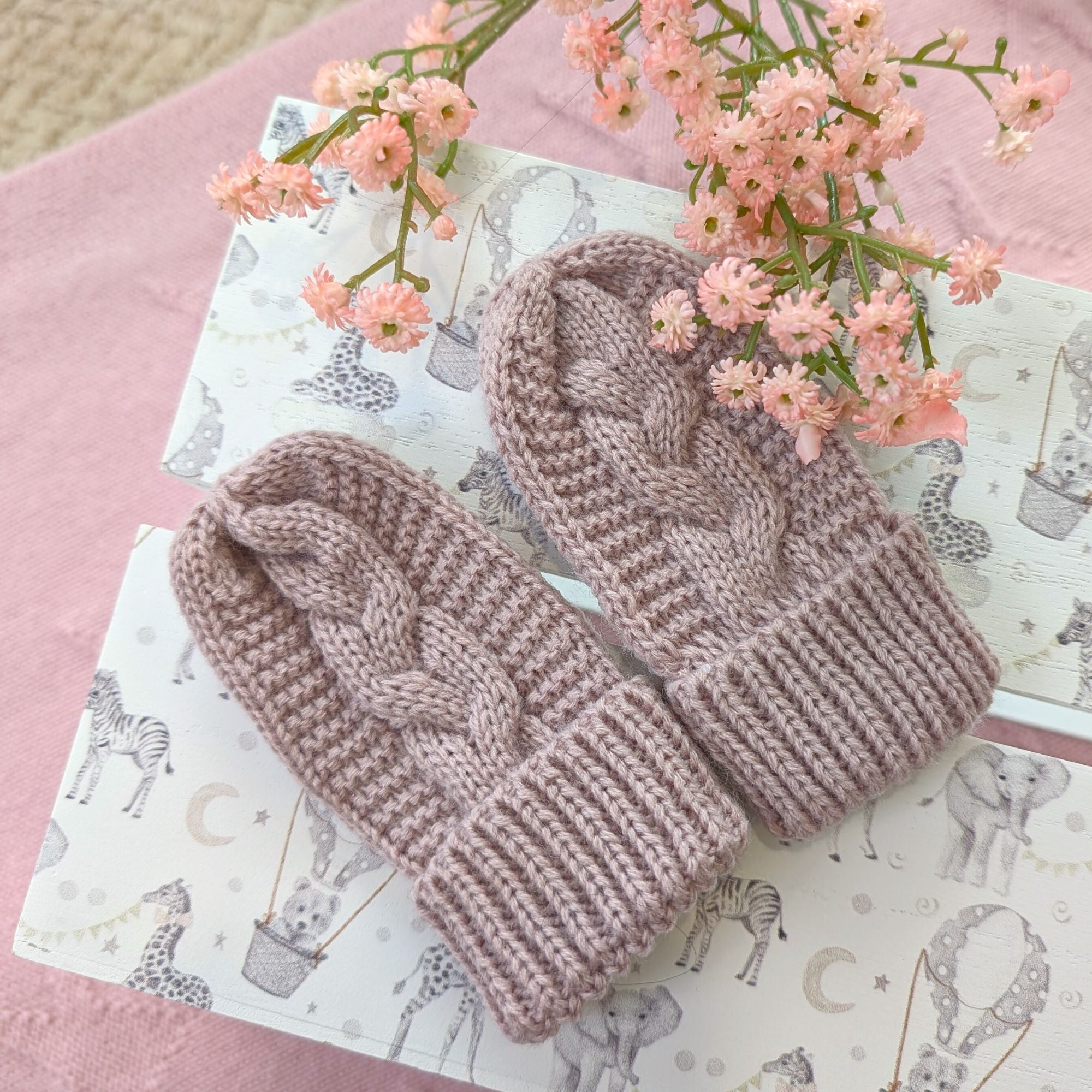 baby girl knit mittens in dusky pink