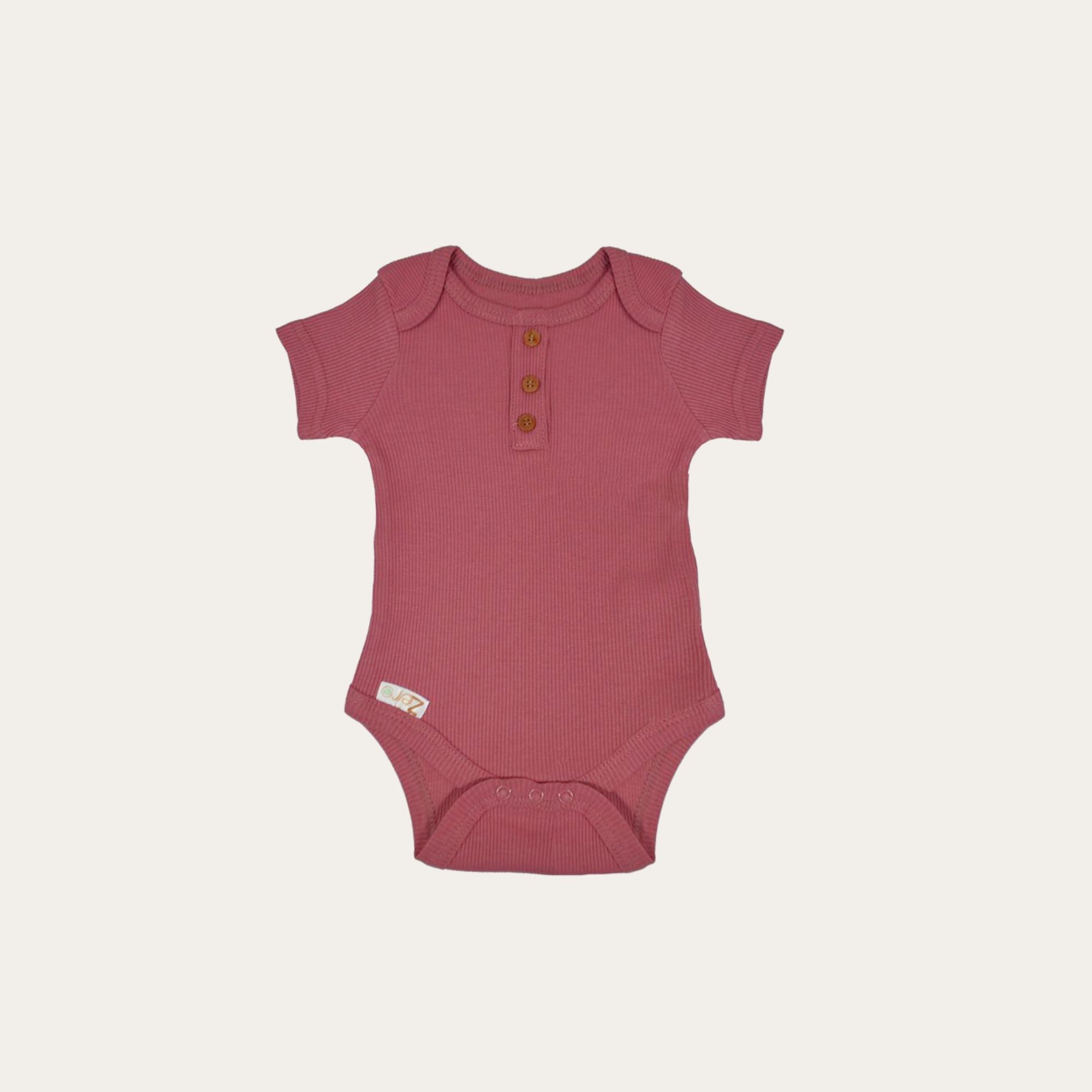 dusky pink / berry baby vest which is eco friendly