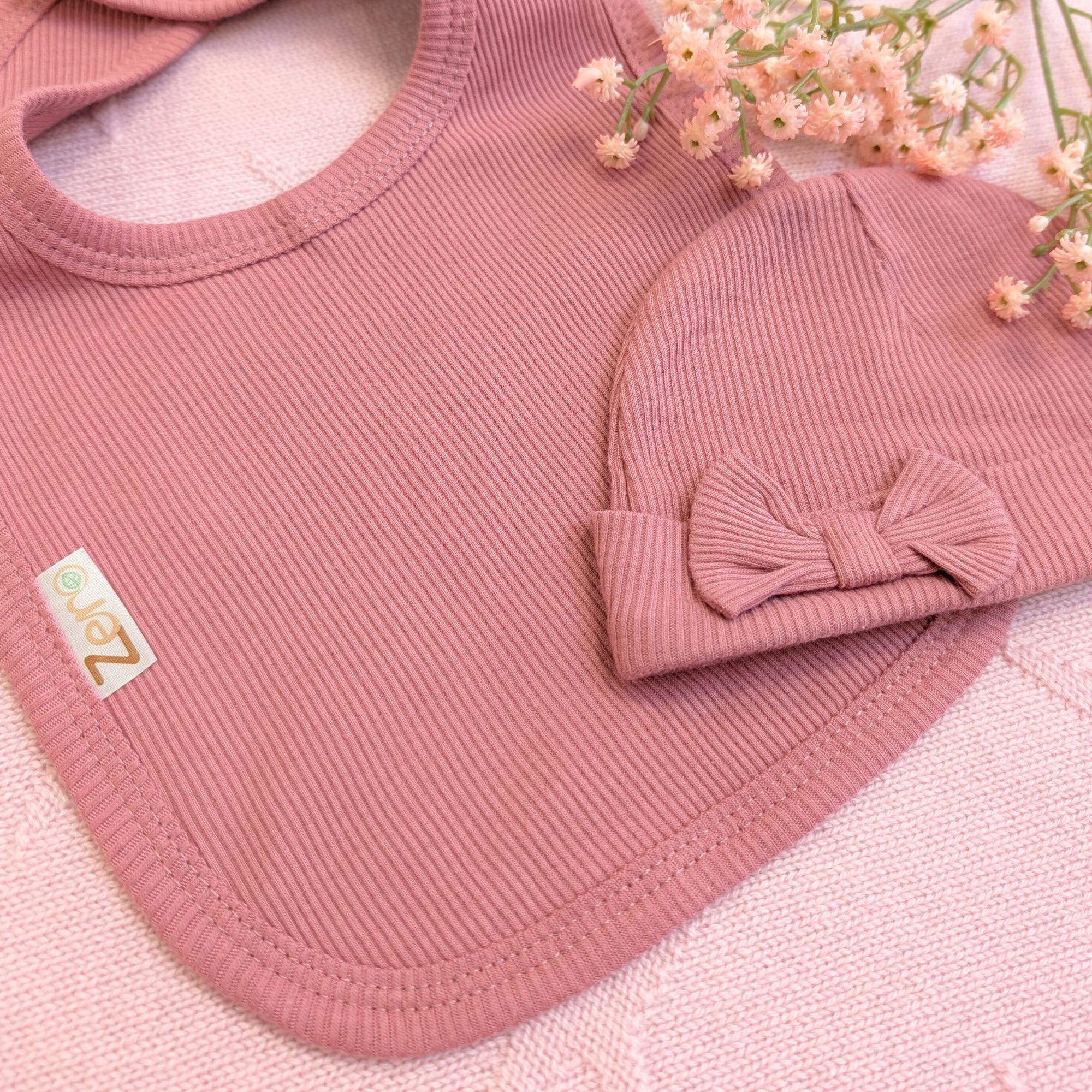 gifts set for a baby girl hat and bib set in dusky pink