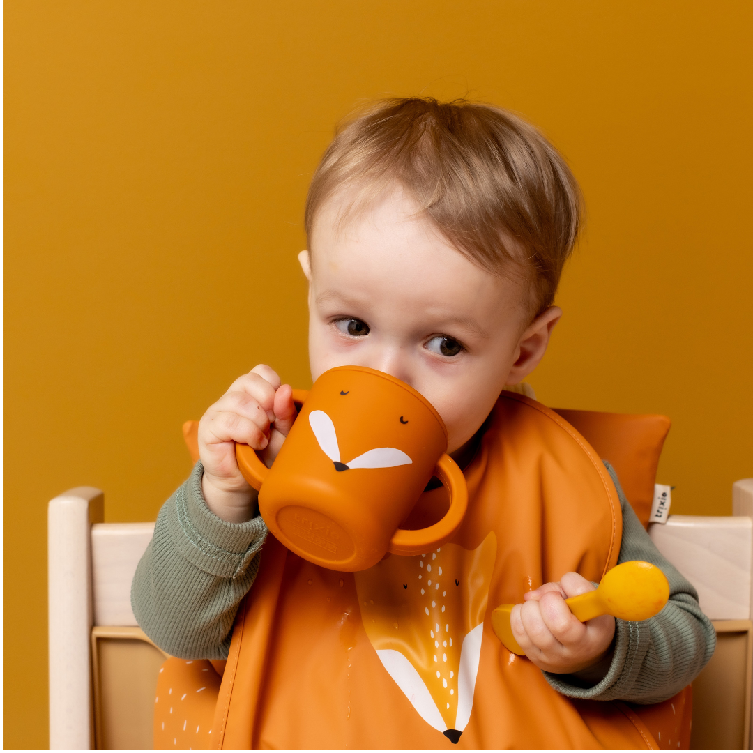 Easy-Grip Mr. Fox Sippy Cup with ergonomic handles for toddlers, designed for spill-free sipping and convenience for on-the-go parents.