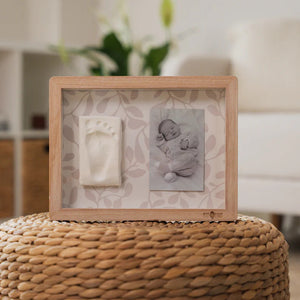 ivy Grey Baby Imprint & Photo Frame with reversible beige background, hypoallergenic clay, and tools for capturing keepsakes.