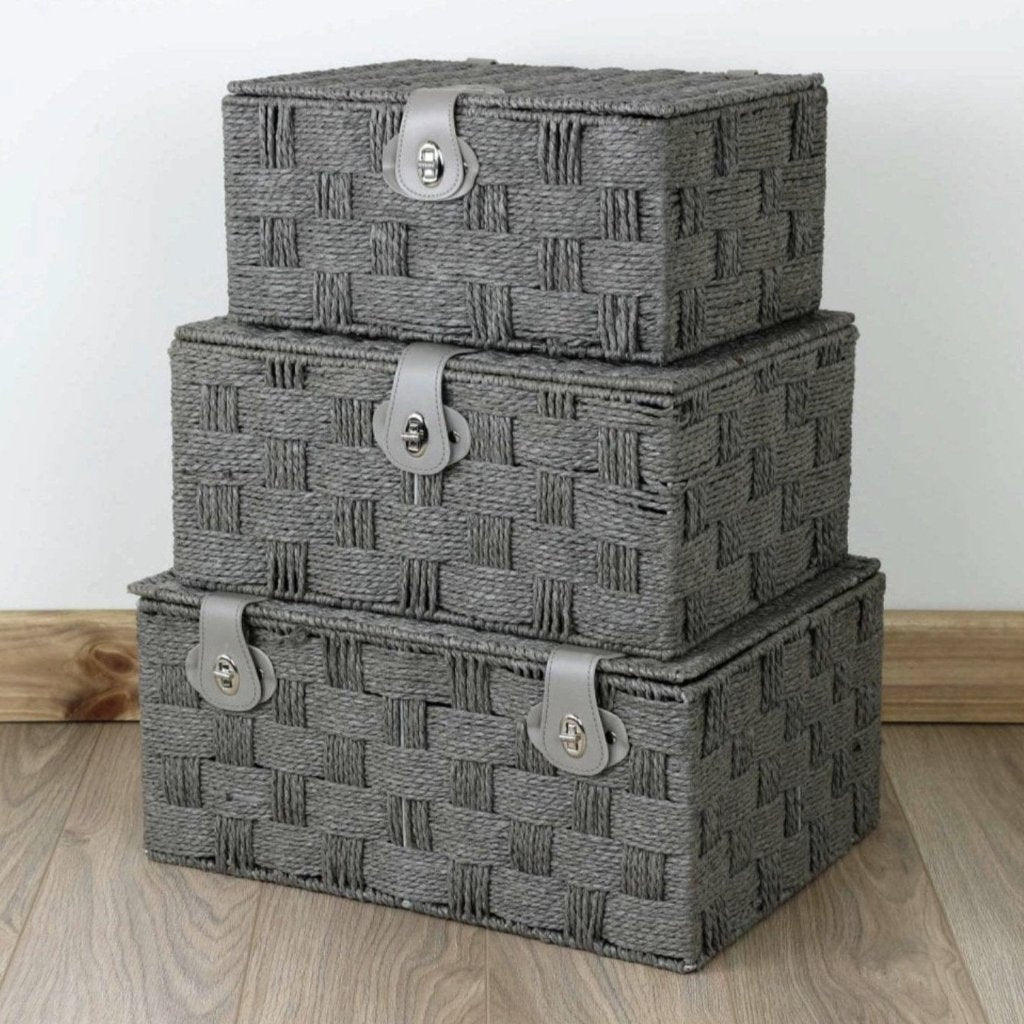 Stack of gift hamper baskets in grey