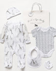 Unisex neutral baby clothing gift set in white with giraffe print