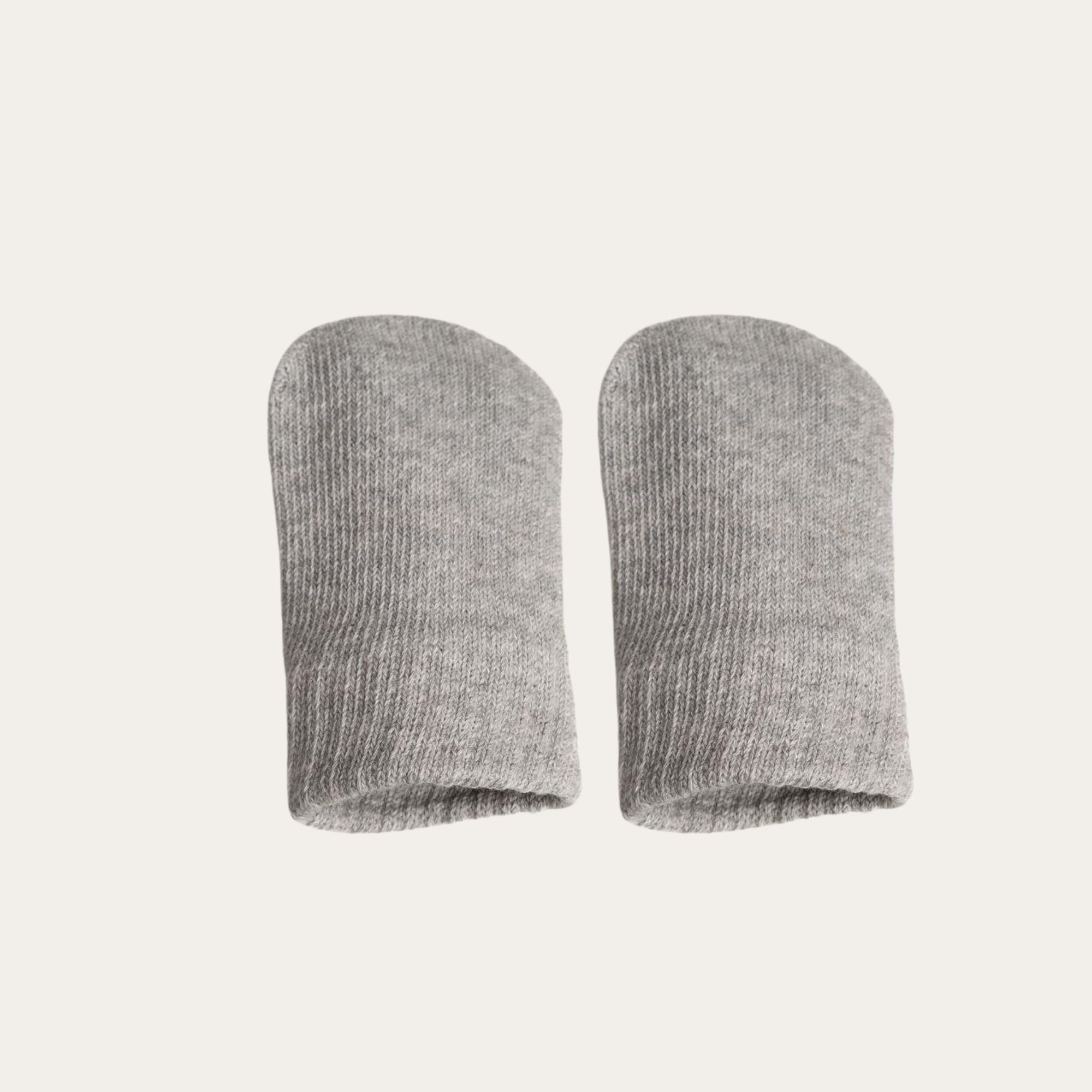 A pair of 100% brushed cotton mittens in a soft grey