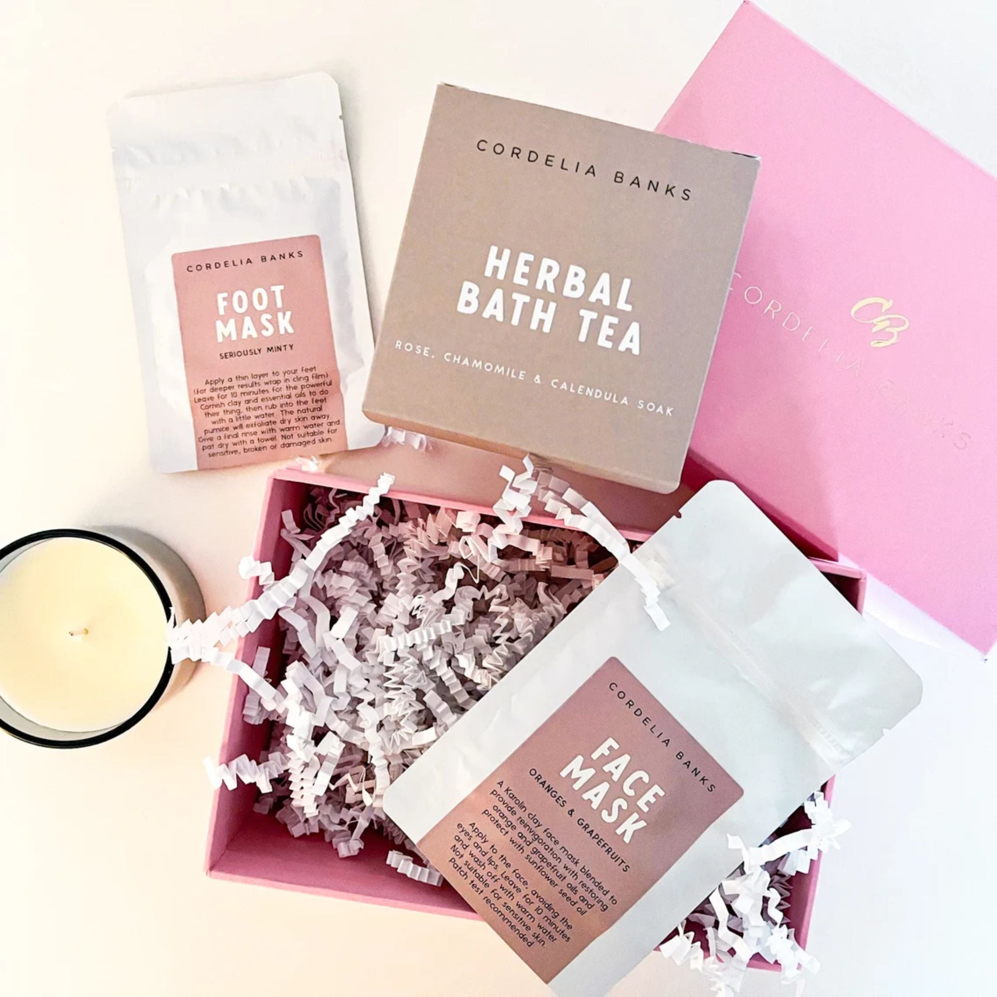 pamper kit for a new mum with herbal tea, face mask, foot mask and candle