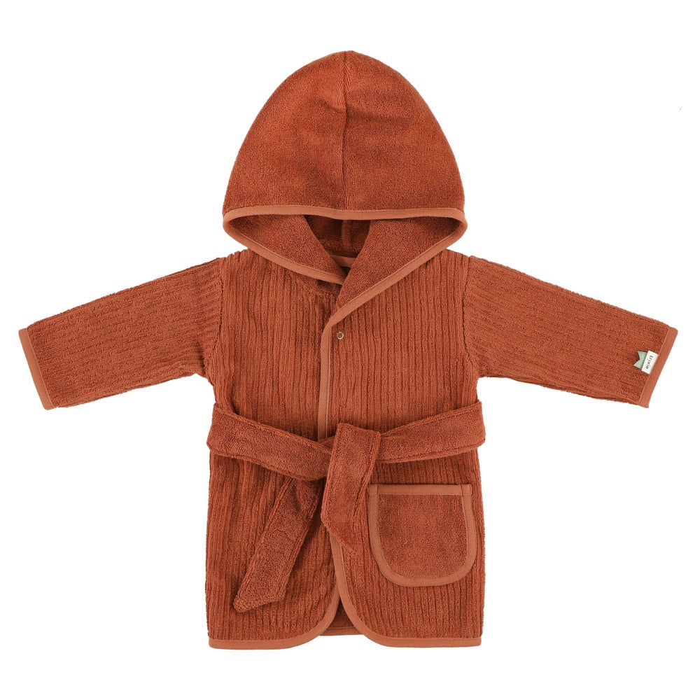 A rust-orange baby bathrobe with a tie belt.