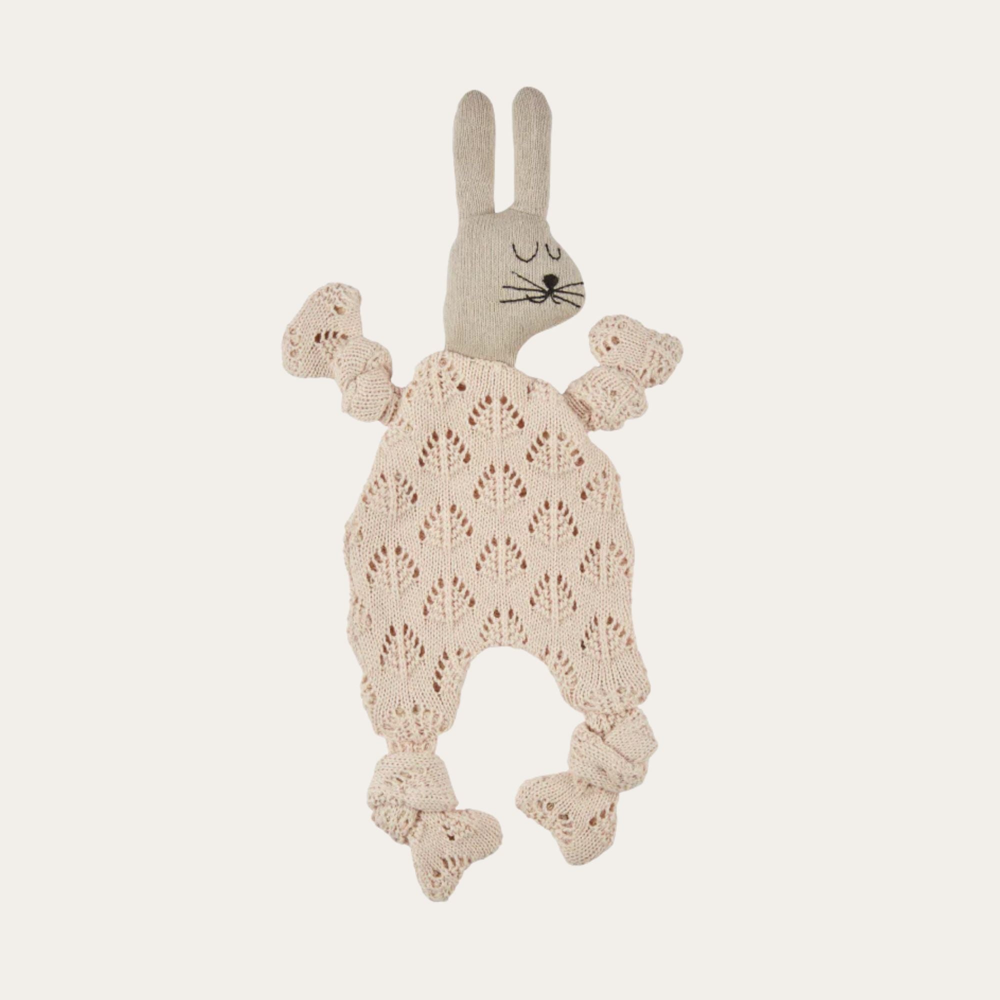 pale pink knitted comforter soft toy