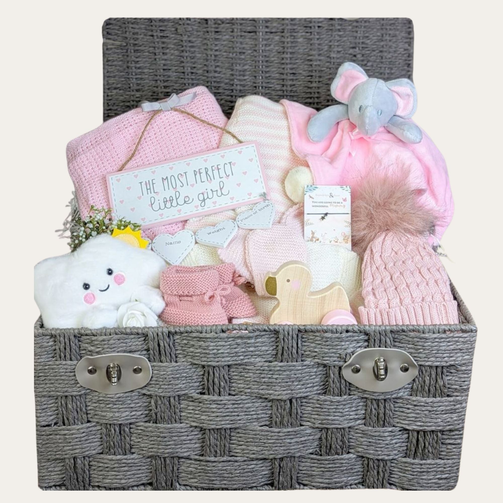 Baby girl gifts basket with pink baby clothing set, elephant toy, nursery plaque, blanket and more. In a large hamper.