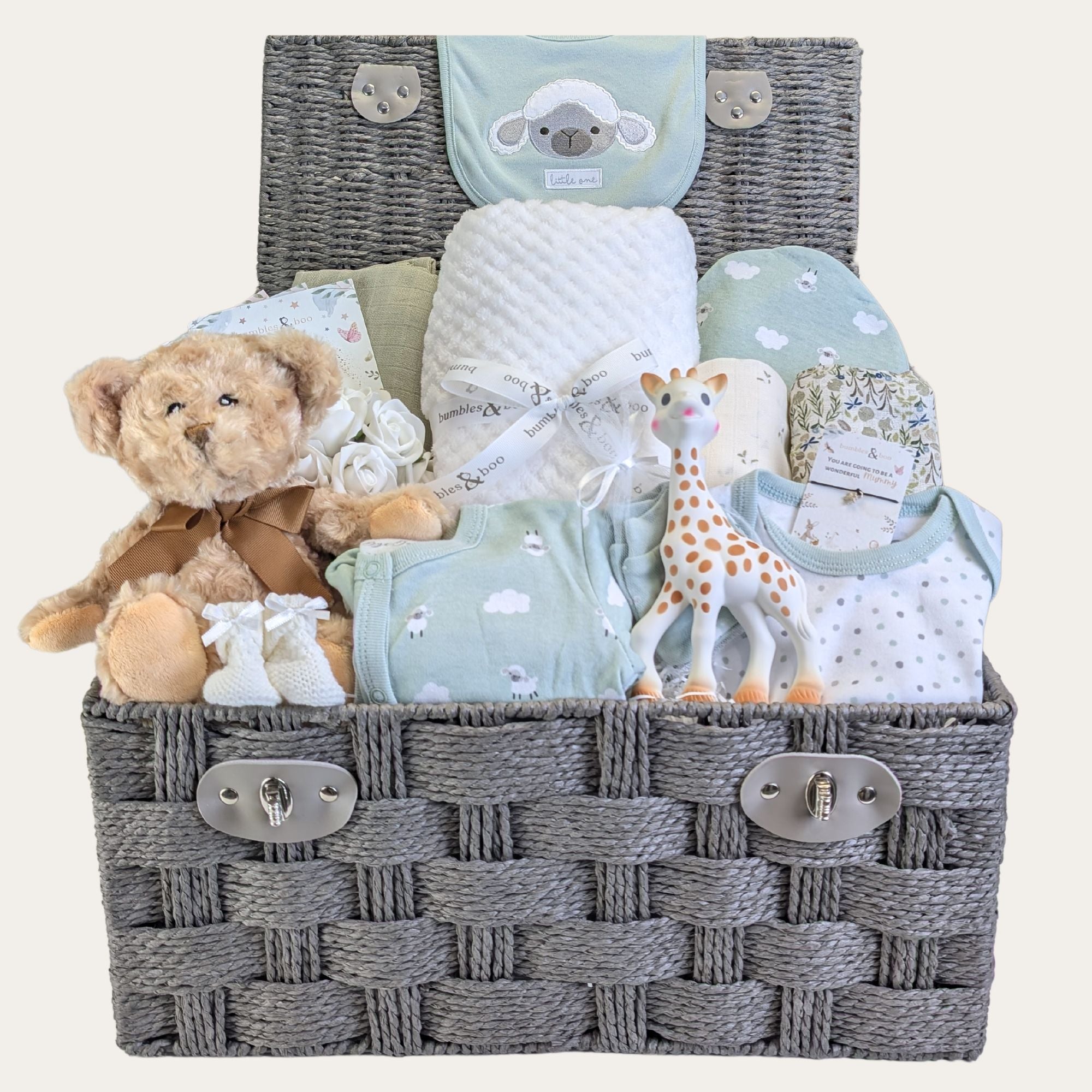 baby shower gifts hamper with clothing, teddy bear and teething toy