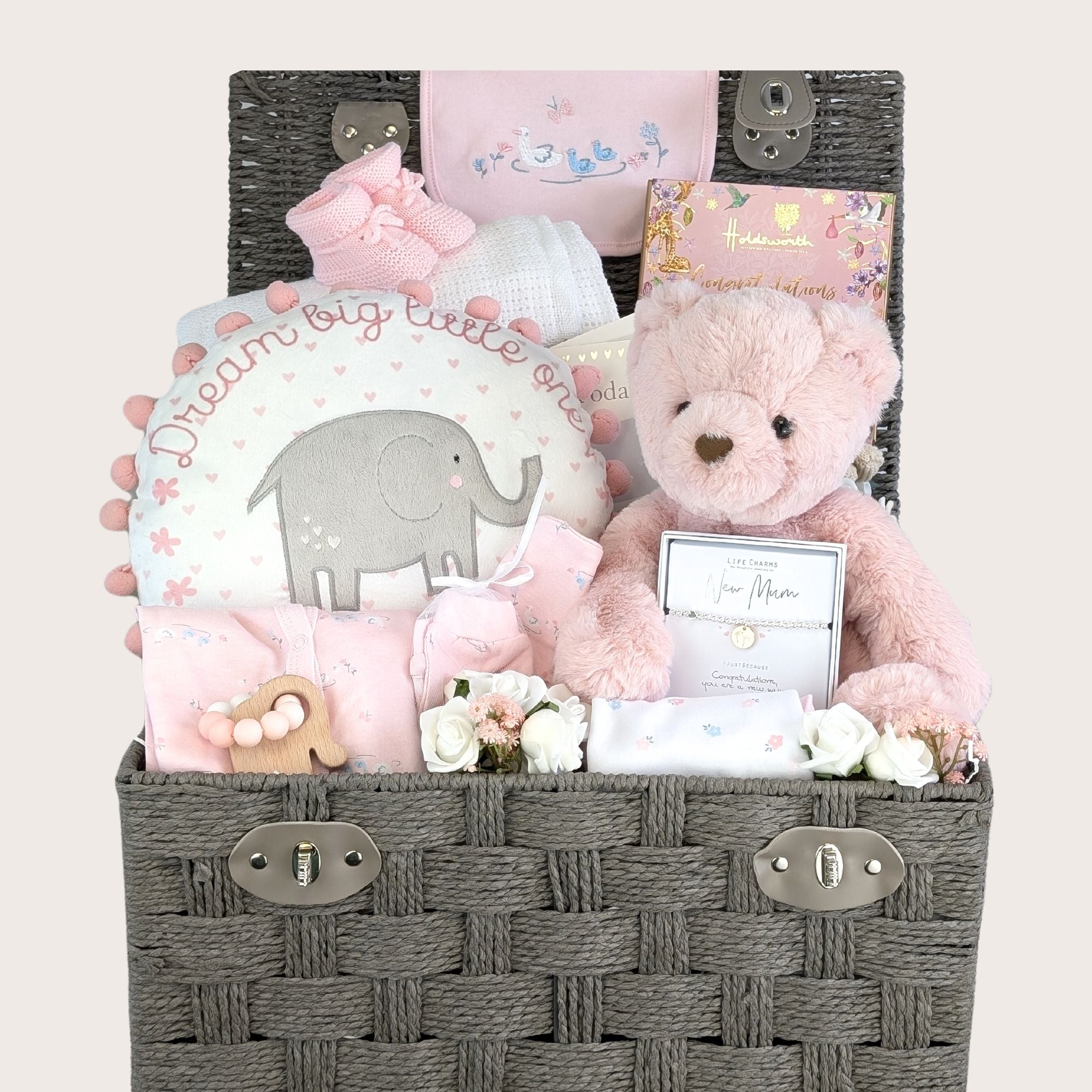 a large new mum hamper basket which includes chocolates, bracelet, reddy bear, teething toy, clothing set, blanket, booties and keepsake basket.