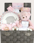 a large new mum hamper basket which includes chocolates, bracelet, reddy bear, teething toy, clothing set, blanket, booties and keepsake basket.