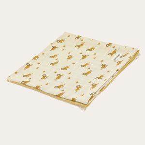 The 3-pack of Organic Cotton Muslin Cloths displayed with prints and solid colours.