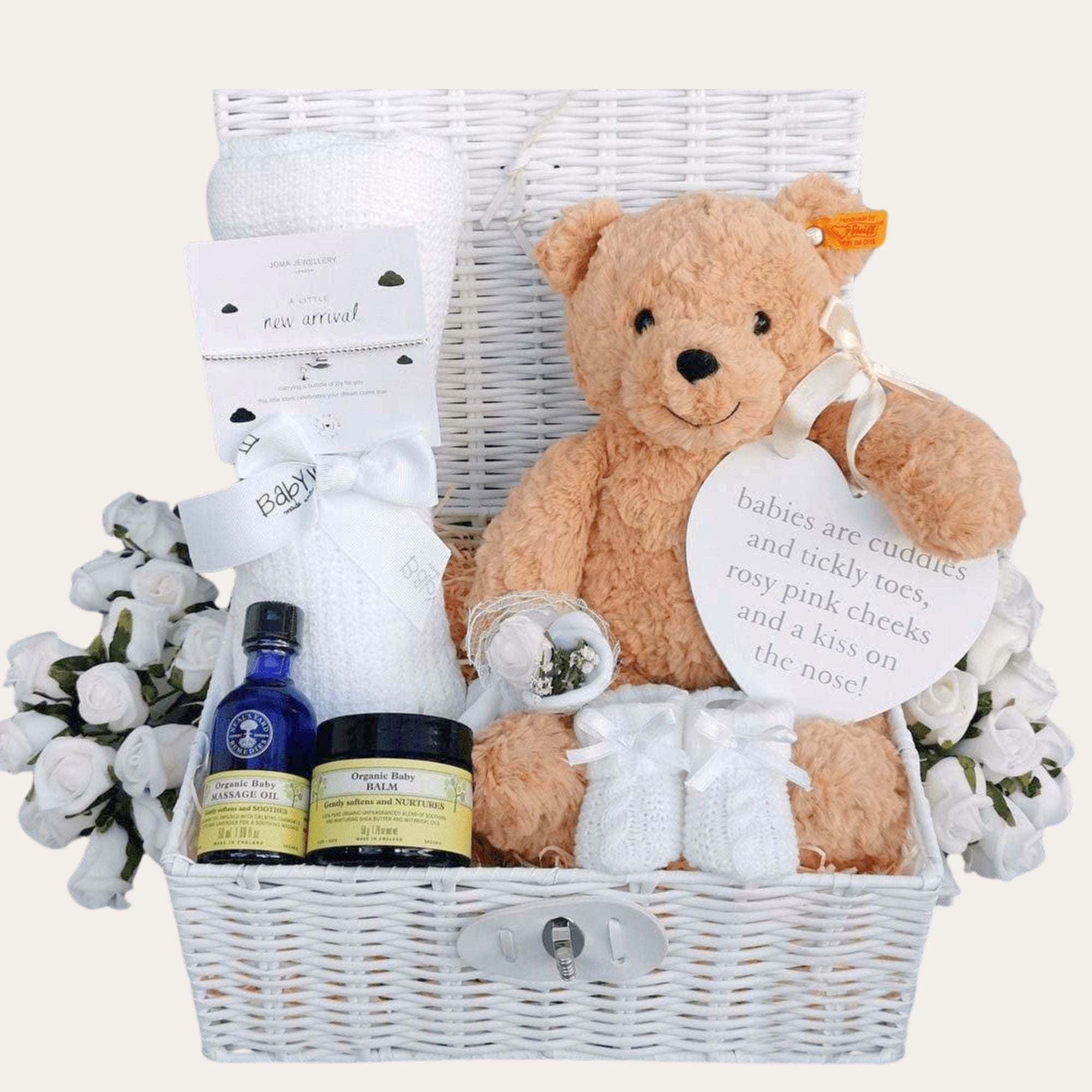 New baby gifts hamper basket with steiff teddy bear, blanket, skincare and bracelet for mum.