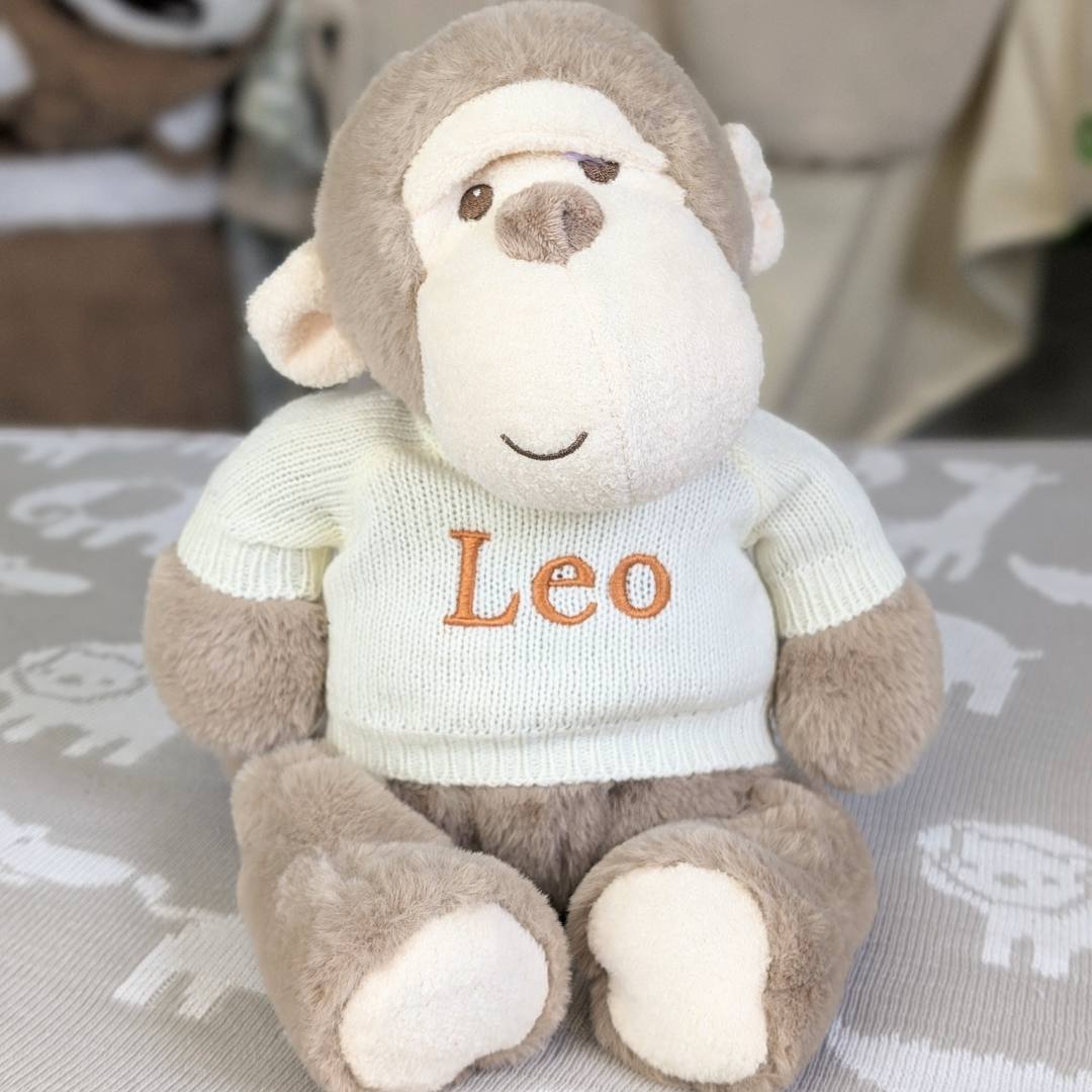 personalised monkey soft toy wearing a jumper.