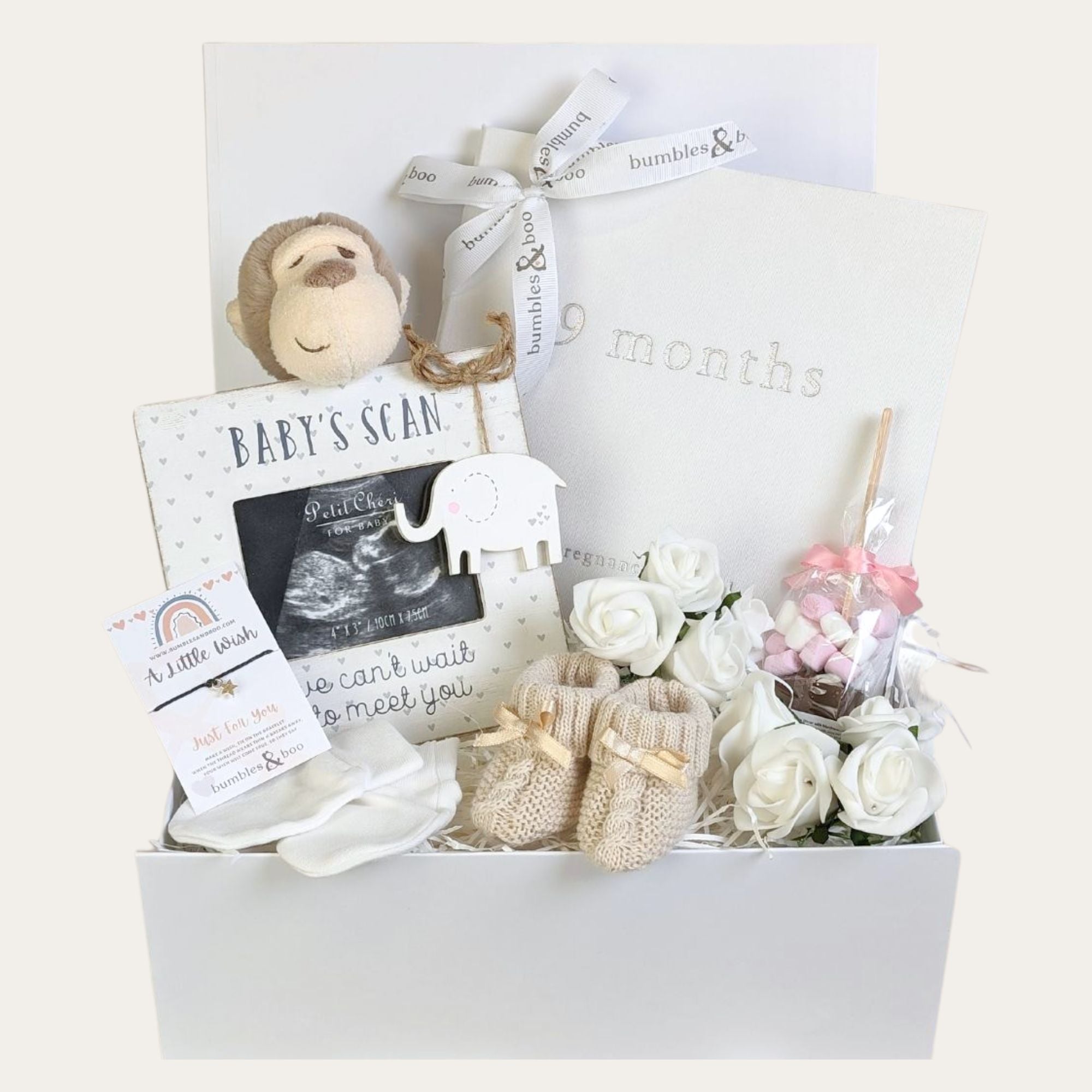 mum to be gifts box hamper with pregnancy journal and monkey theme.