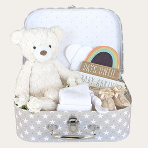 mum to be gifts trunk which includes teddy bear, pregnancy plaque, baby mittens, baby hat and baby booties