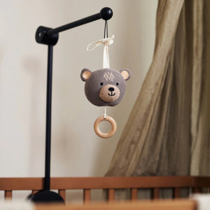 Musical Bear with pull string, plays “Sleep, Dear Child, Sleep,” ideal for soothing babies.