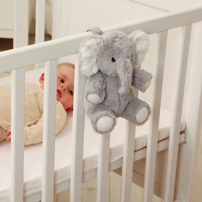 soft grey elephant soft sensory toy that attaches to cots or pushchairs and plays soothing music