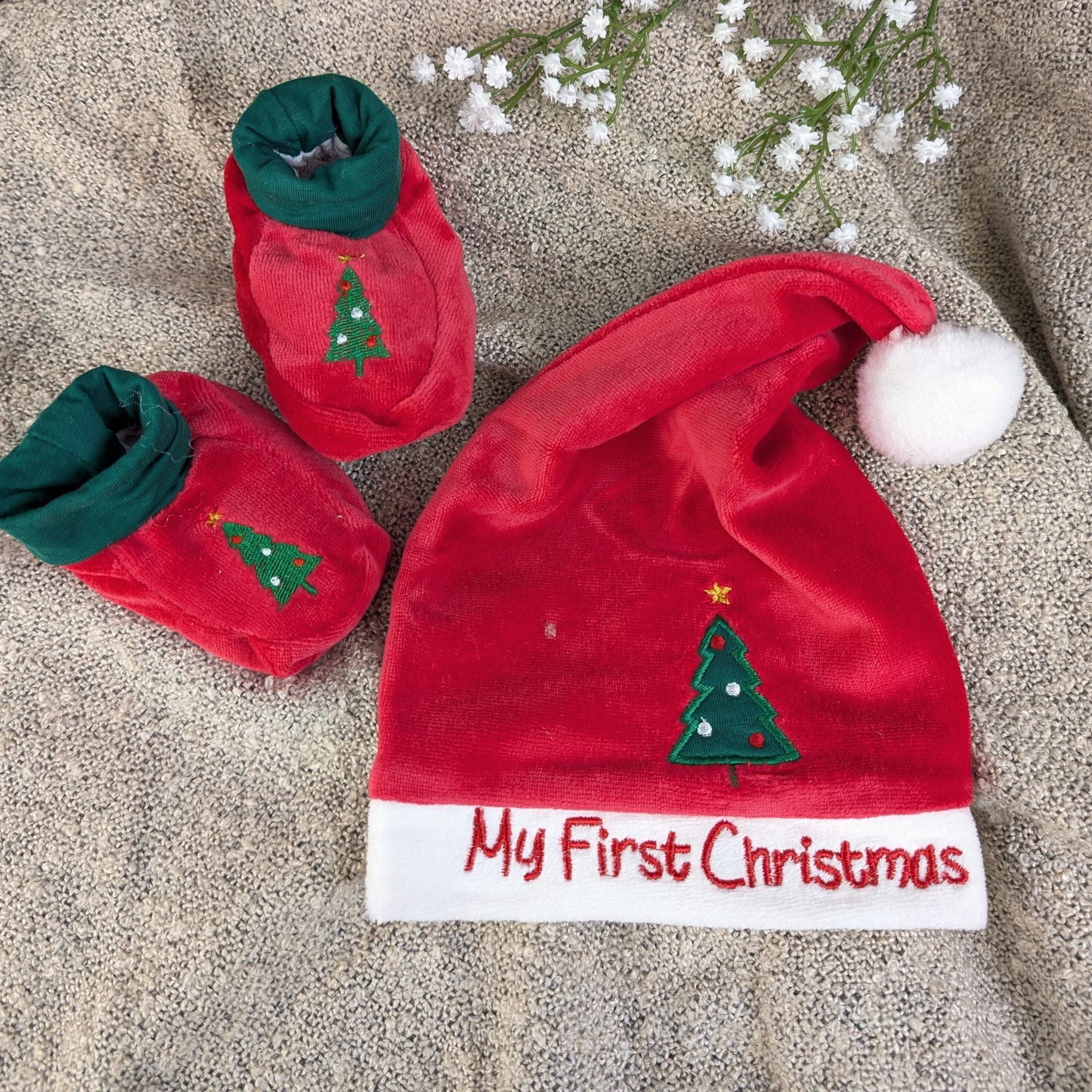 my first Christmas hat and booties set red with Christmas tree design