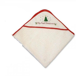 A soft white absorbent hooded baby towel with 'my first Christmas' embroidered on the hood