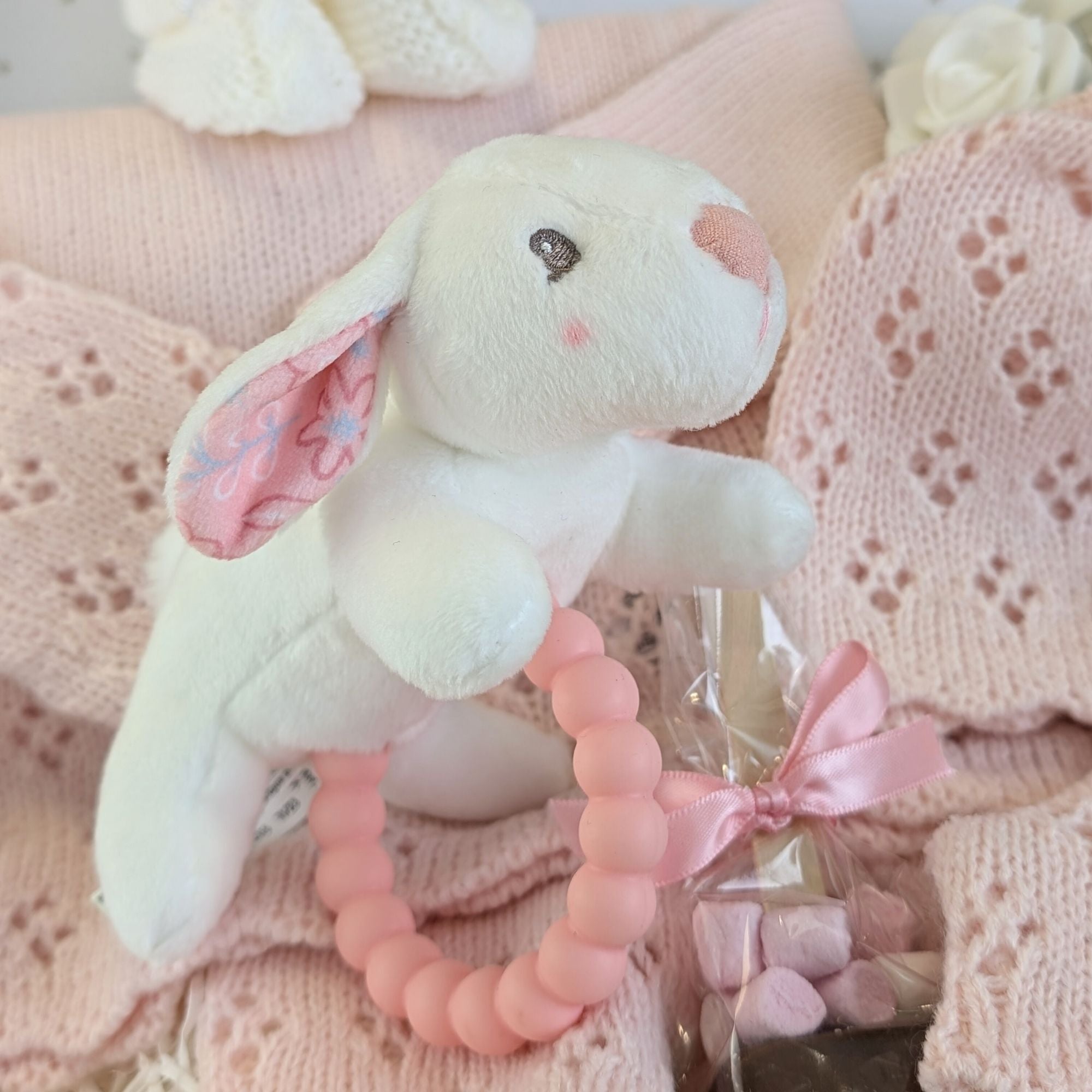 new baby gifts hamper with pink bunny comforter and knit clothing set