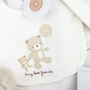 Bear bib in cream and brown with bears holding a balloon.