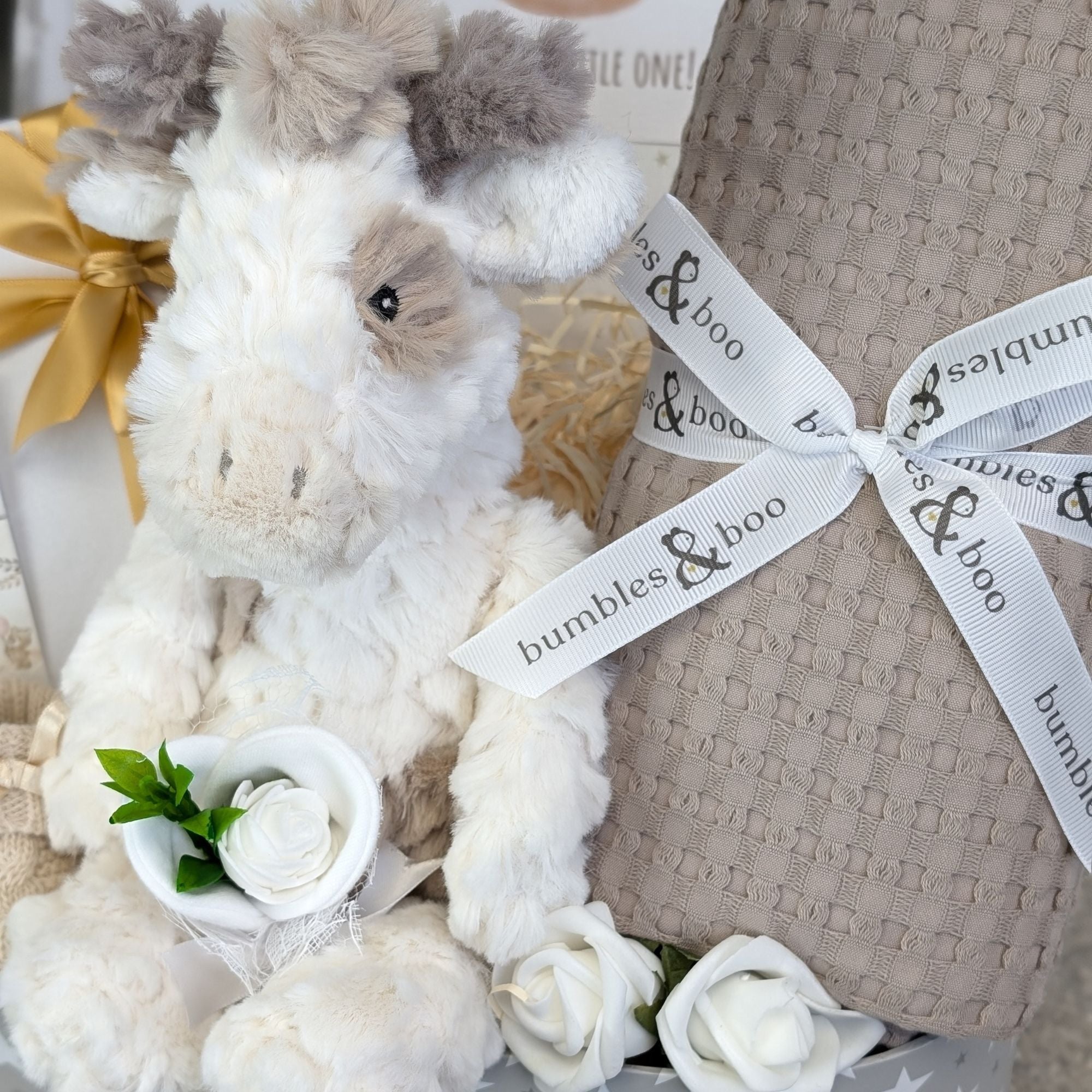 new baby gifts box with giraffe and blanket plus chocolates and gift for mum.