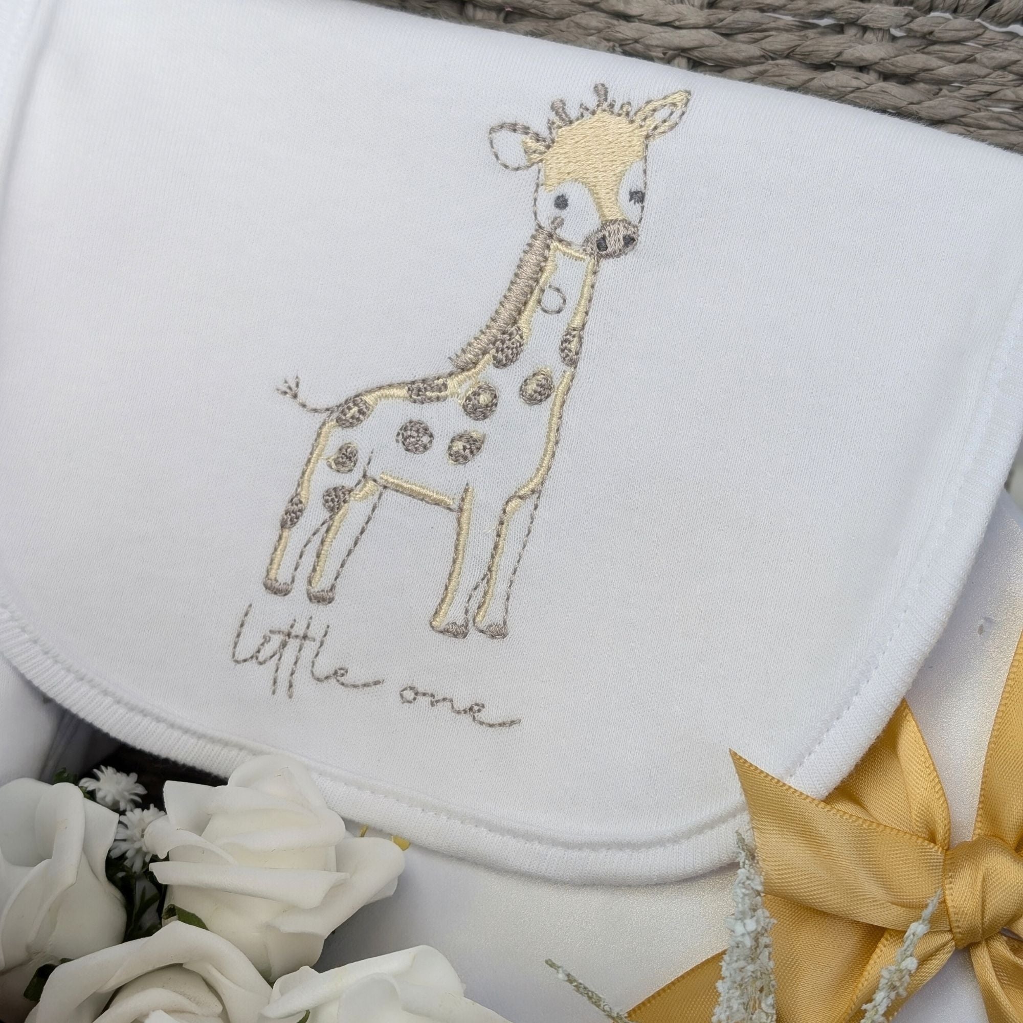 new mum gifts basket with giraffe theme baby clothing, giraffe soft toy, chocolates, baby booties, mug for daddy and wish bracelet for mummy