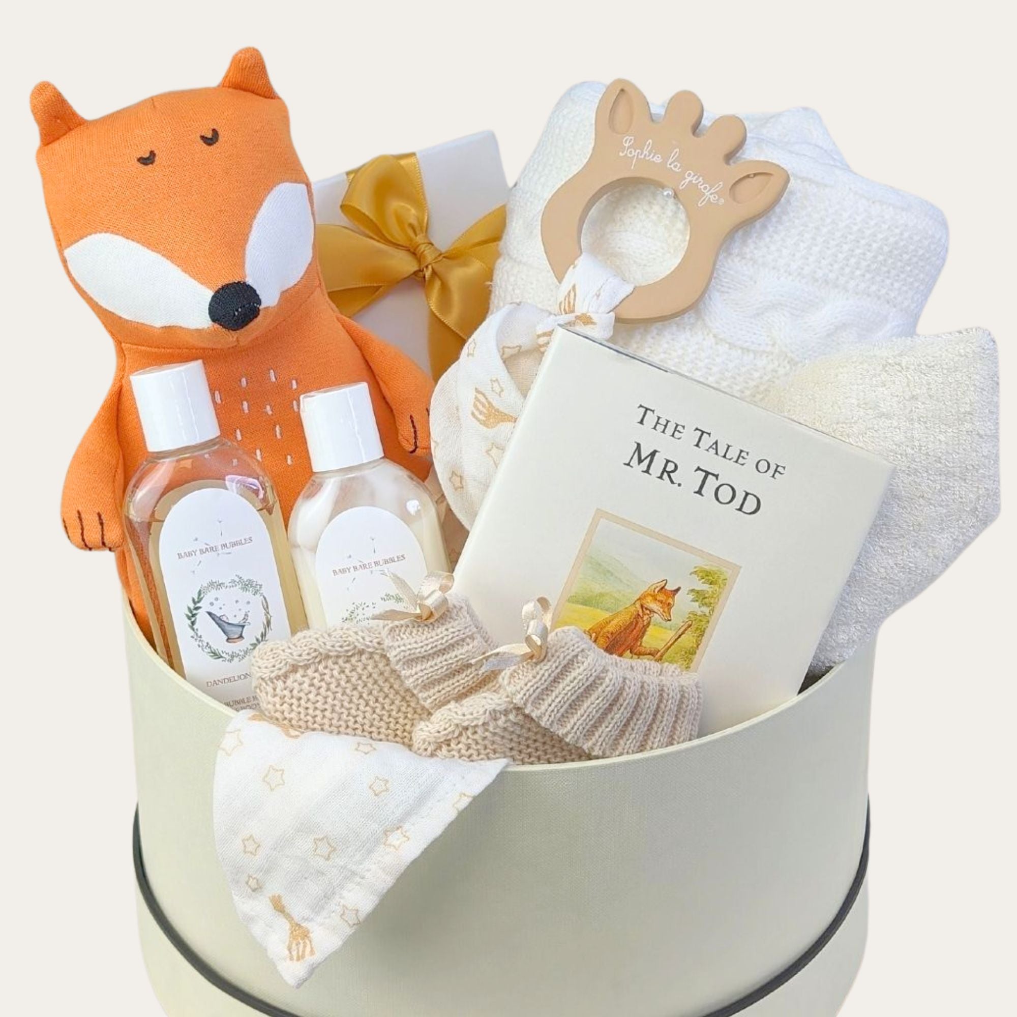 new mum and baby hamper with knit blanket, chocolates, fox soft toy, baby wash and story book. Bumbles and boo