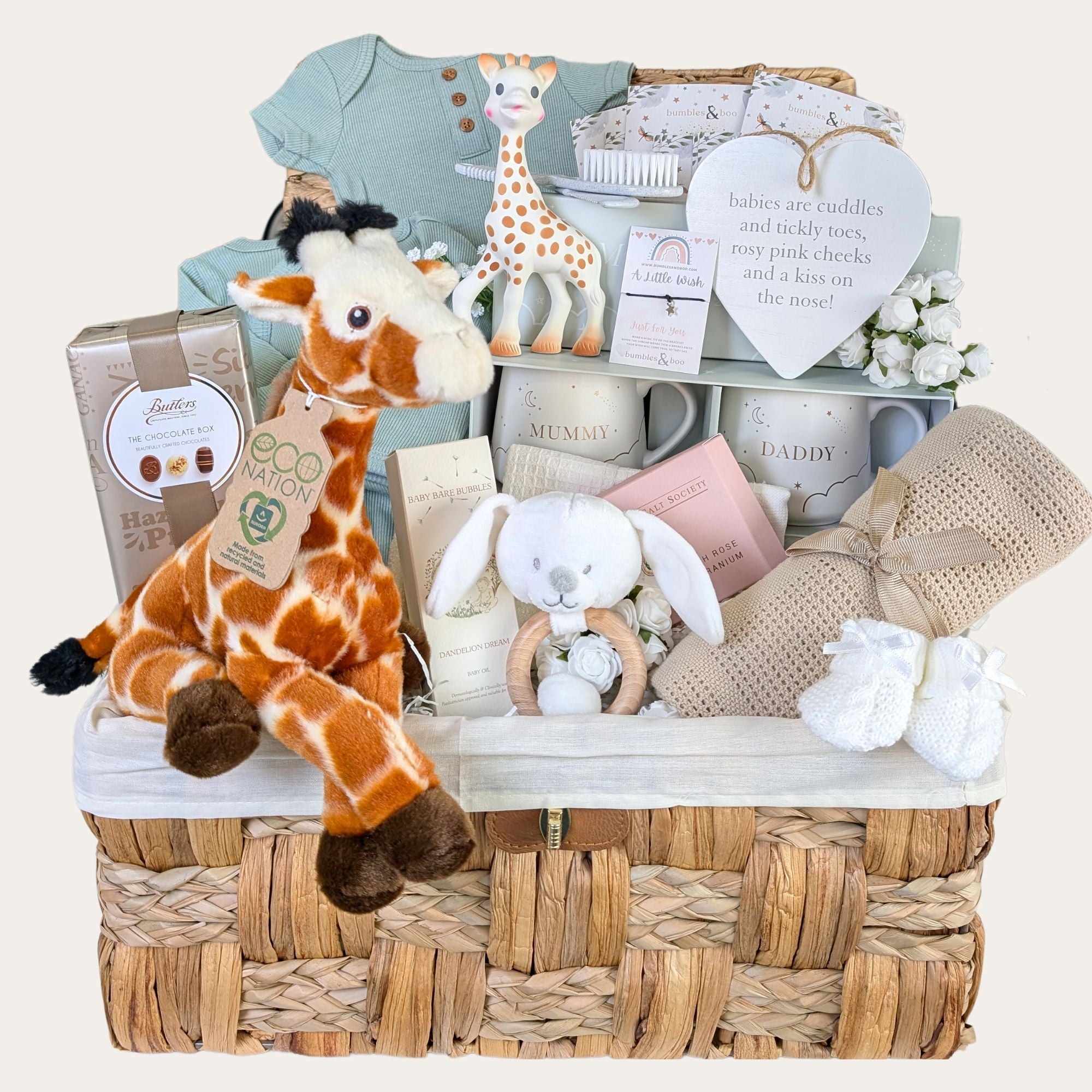 new parent hamper with giraffe theme, baby blanket, mum and dad mugs, baby clothing and chocolates. Bumbles and Boo.