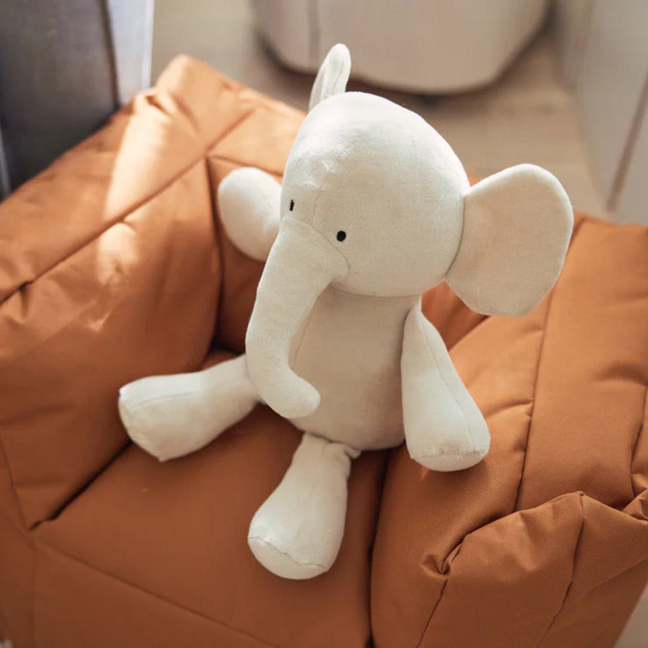 Elephant Cuddly Toy in Nougat velvet fabric with a sturdy trunk, 36x30x17cm, perfect for cuddles and nursery décor.