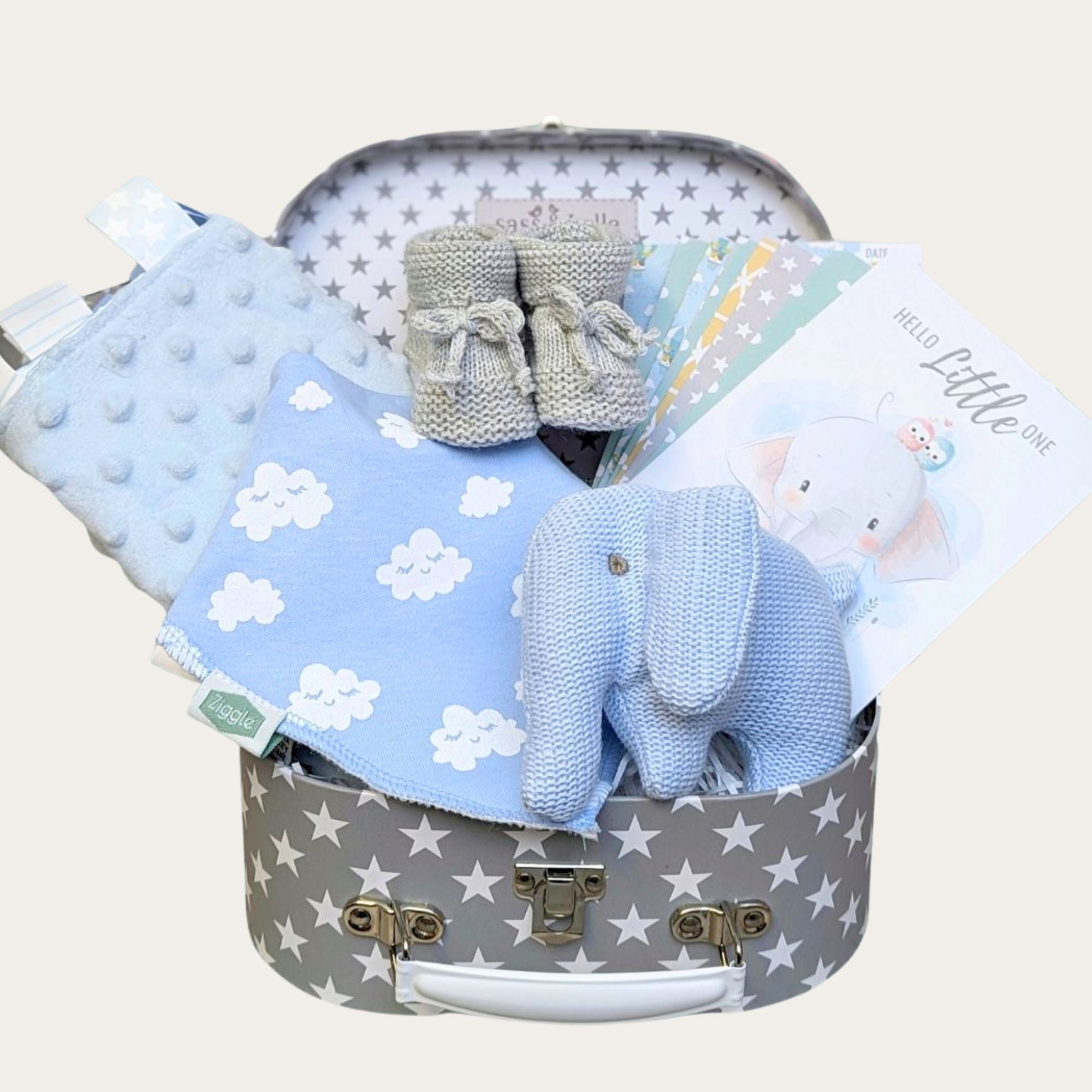 baby boy gifts hamper with blue elephant rattle, bandana bib, milestone cards, booties and taggie blanket