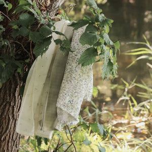 Organic muslin squares in a tree.