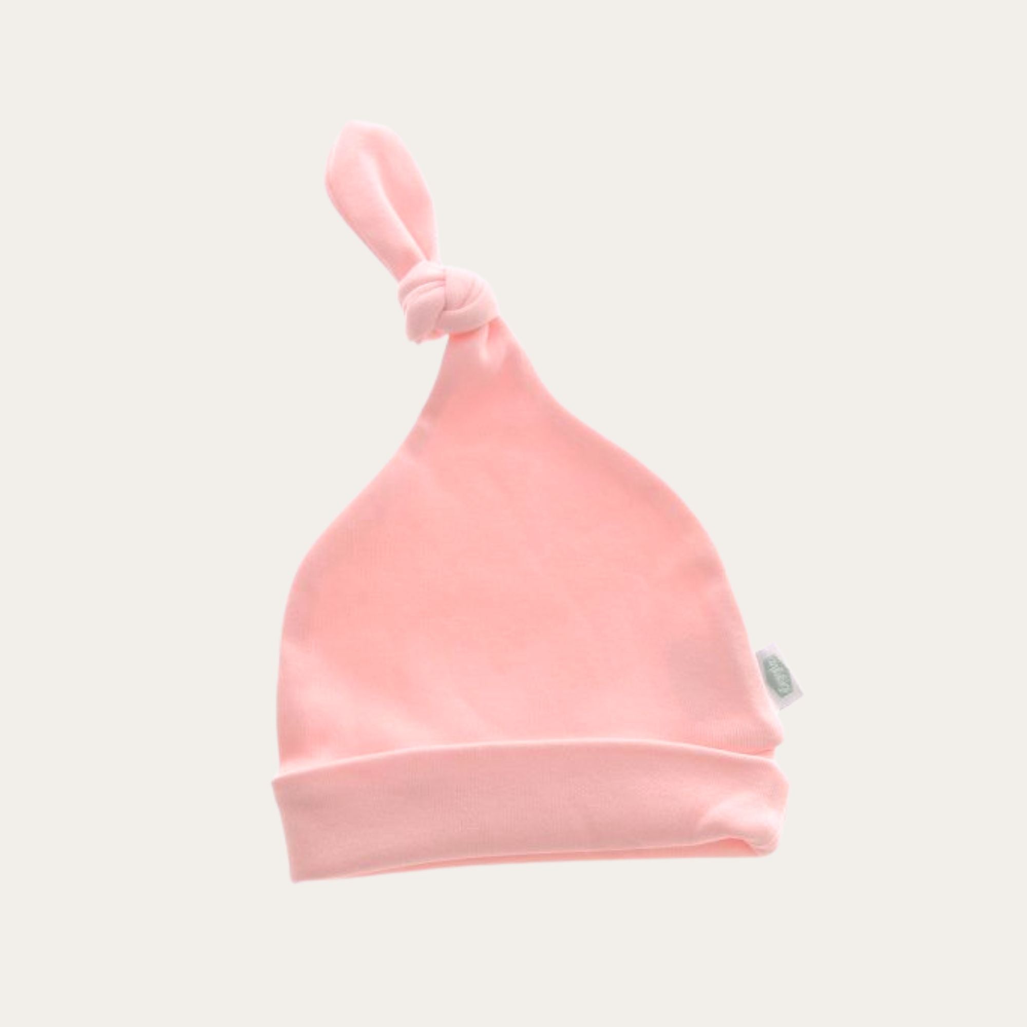 pale pink 100% cotton knot baby hat suitable for up to 6 months approximately. Soft and breathable material. 