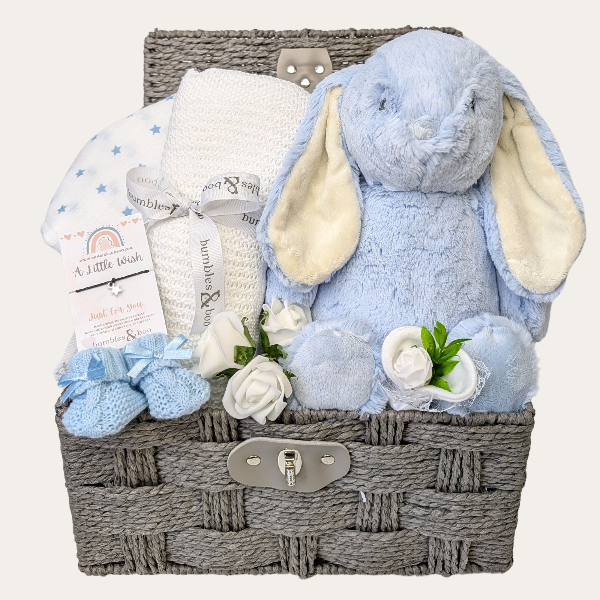 Baby boy gifts hamper with personalised blue bunny, blanket & muslin wrap in a gift basket.