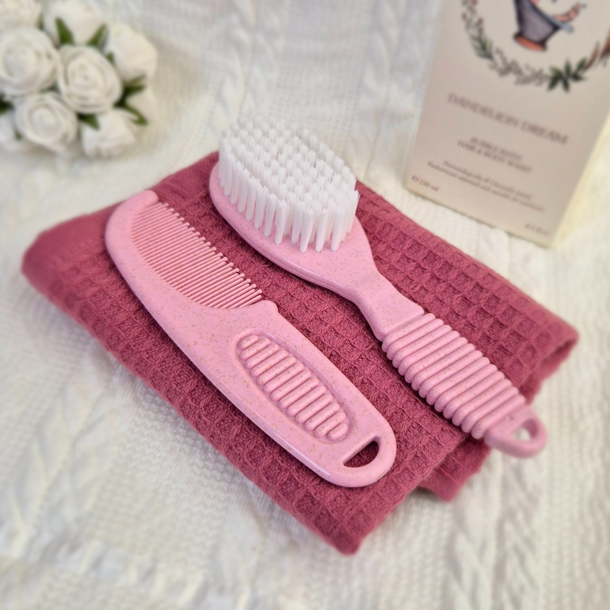 pink deluxe baby brush and comb set made from 80% PP and 20% wheat fibre, gentle and eco-friendly for delicate baby grooming