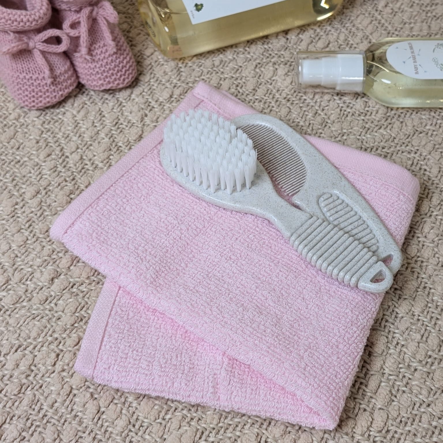 Soft pink baby waffle face cloth, 100% cotton, reversible with terry and waffle textures – Bumbles and Boo.