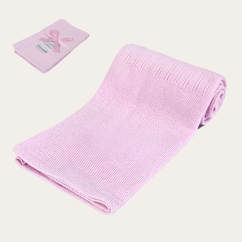 Personalisable pink Cotton Cellular Blanket in use, covering a sleeping baby.