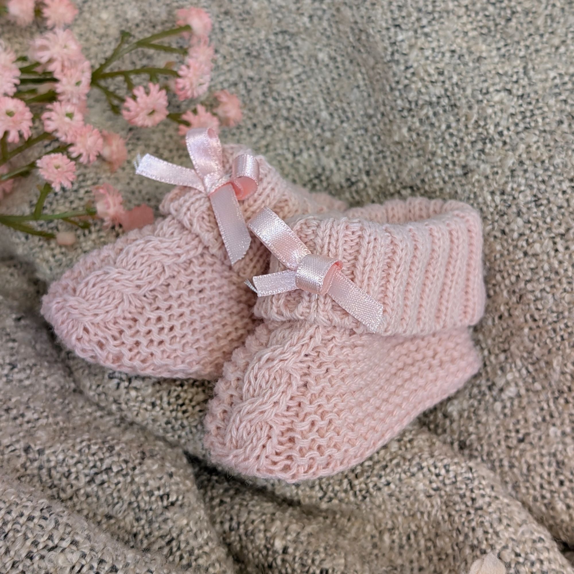 dusky pink baby knit booties with little bows