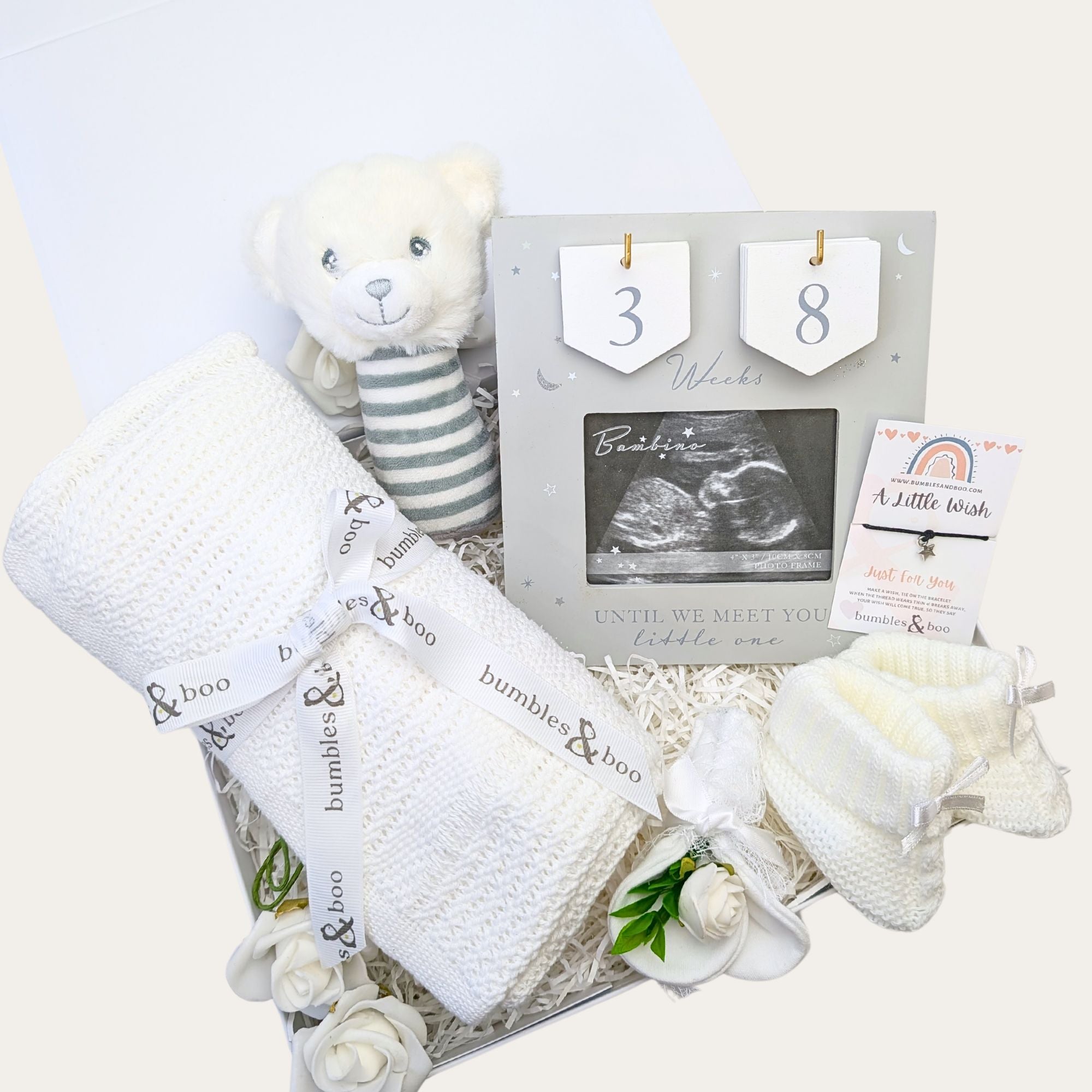 pregnancy gift box with a countdown frame baby blanket baby rattle baby booties and scratch mittens