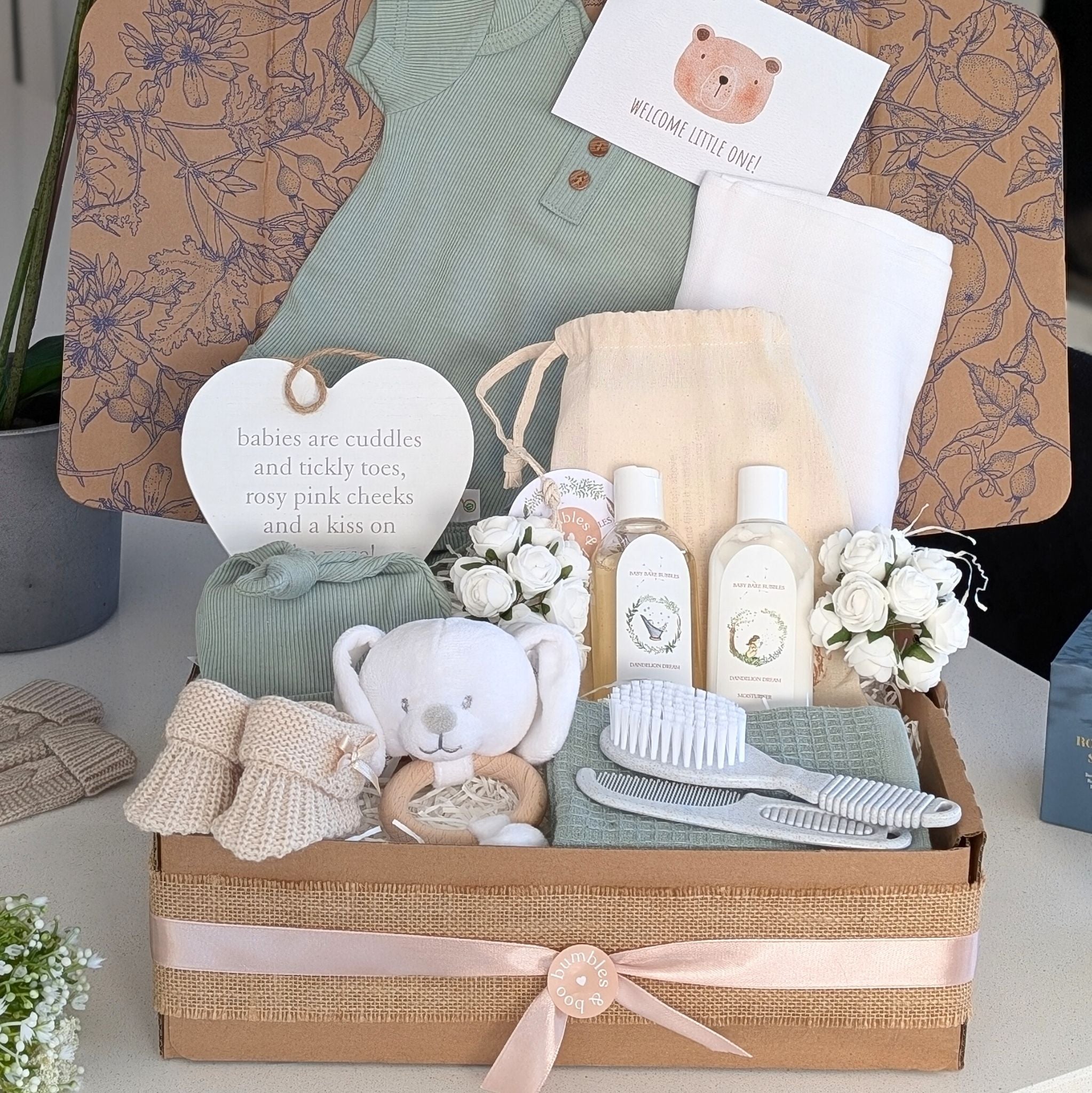 baby gift box planet loving new baby hamper with vest, hat, organic skincare, brush and comb, booties and baby rattle. bumbles and boo.