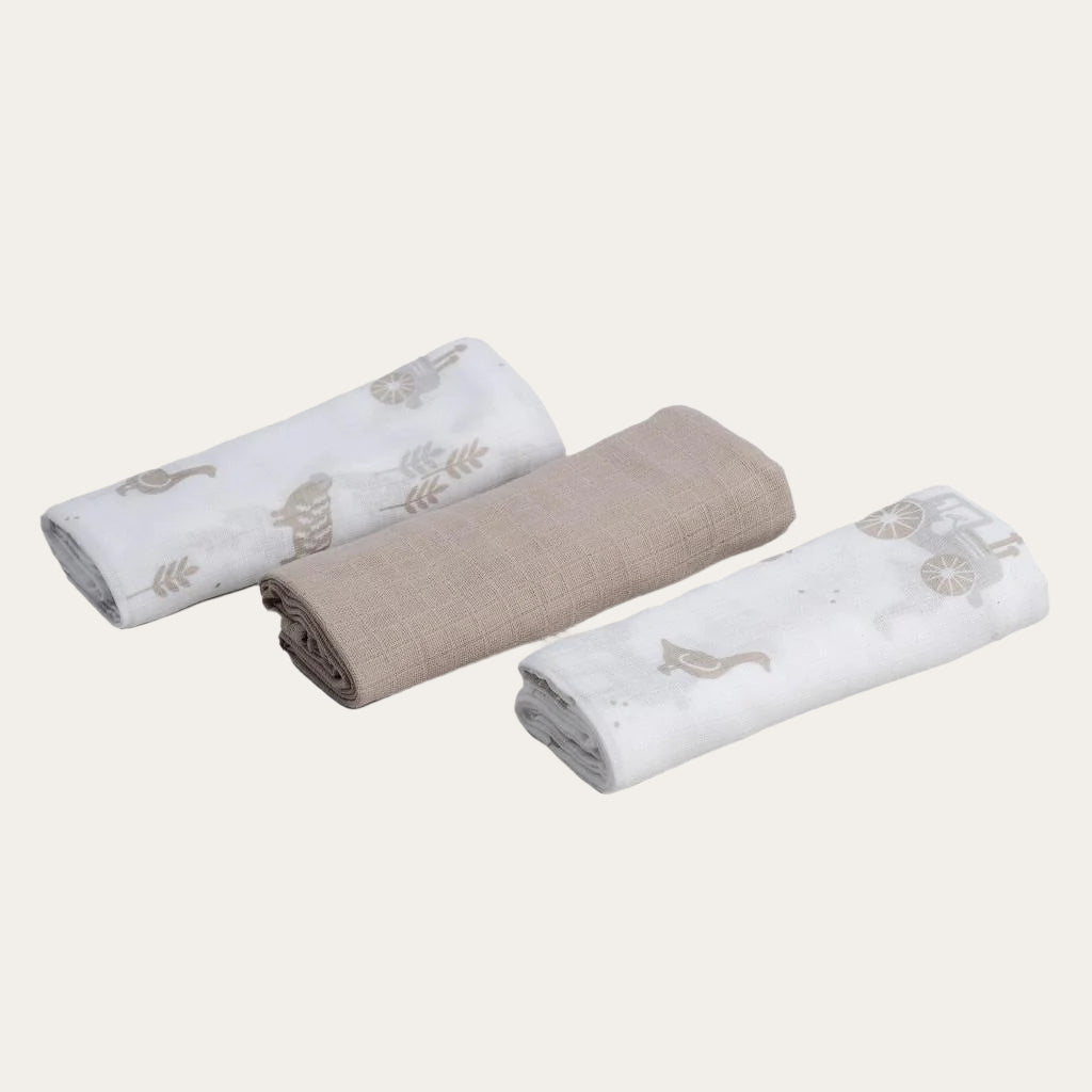 Set of 3 Coffee Woven Muslin Squares folded neatly.