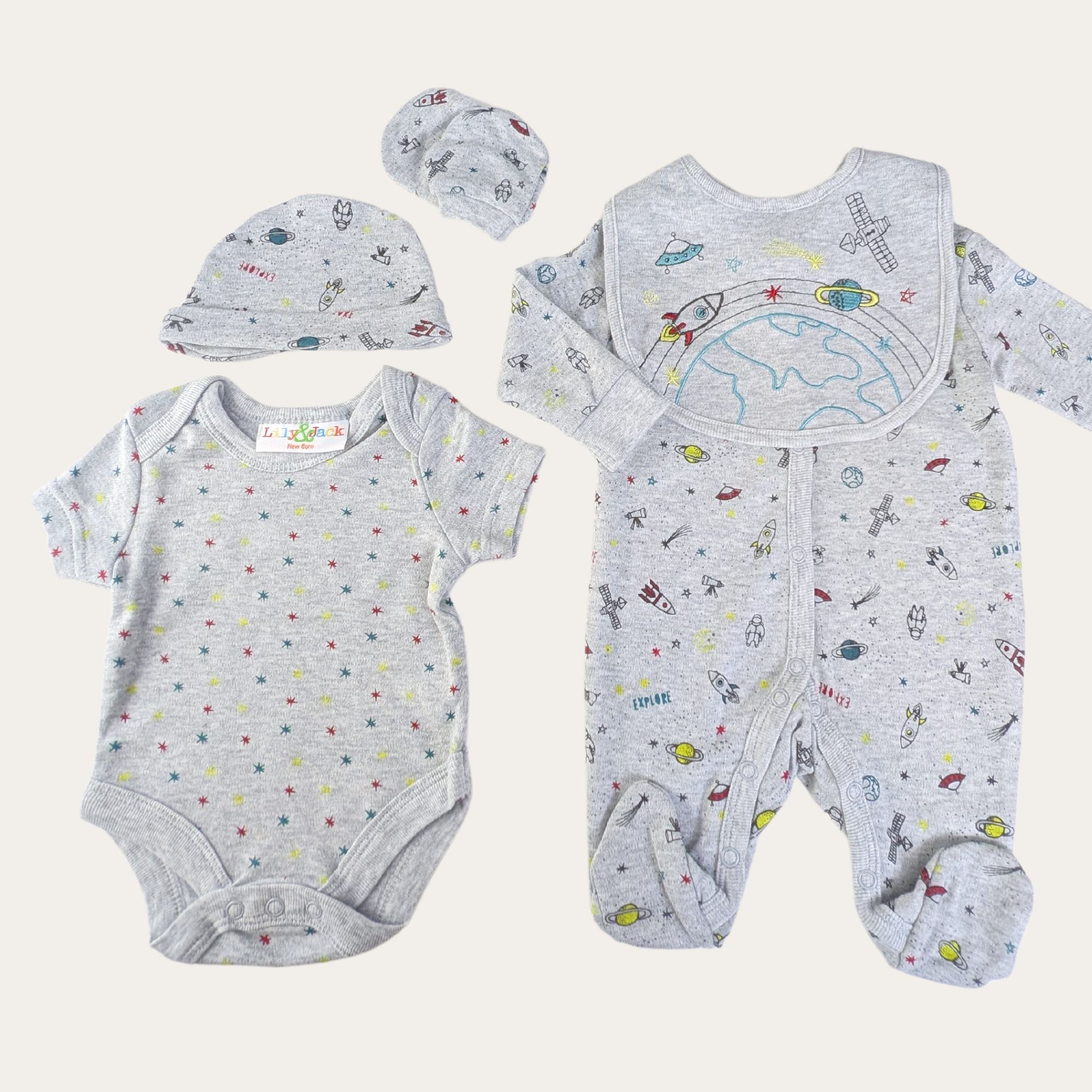 space themed baby clothing set which includes hat, mittens, vest, bib and sleepsuit