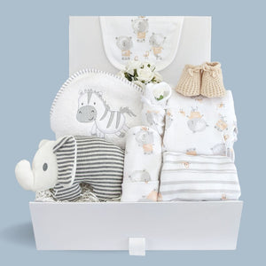 new baby hamper gift. Clothing set to include bib, vest, romper and hat. Elephant baby hand rattle, zebra hooded bath towel and baby mittens.