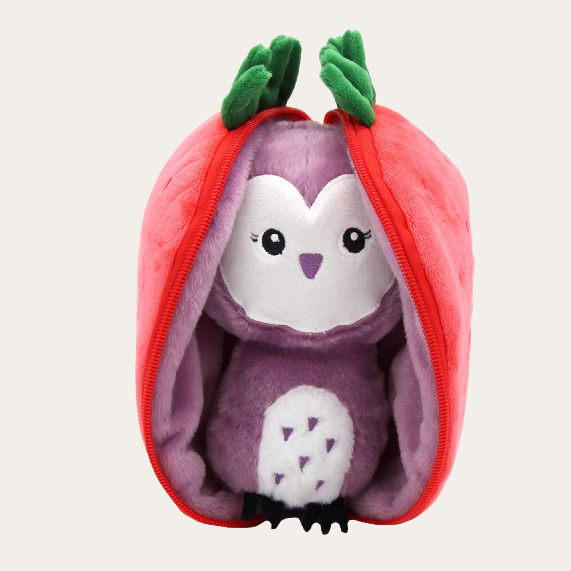 A cute purple owl with big floppy wings tucked inside a zip up strawberry