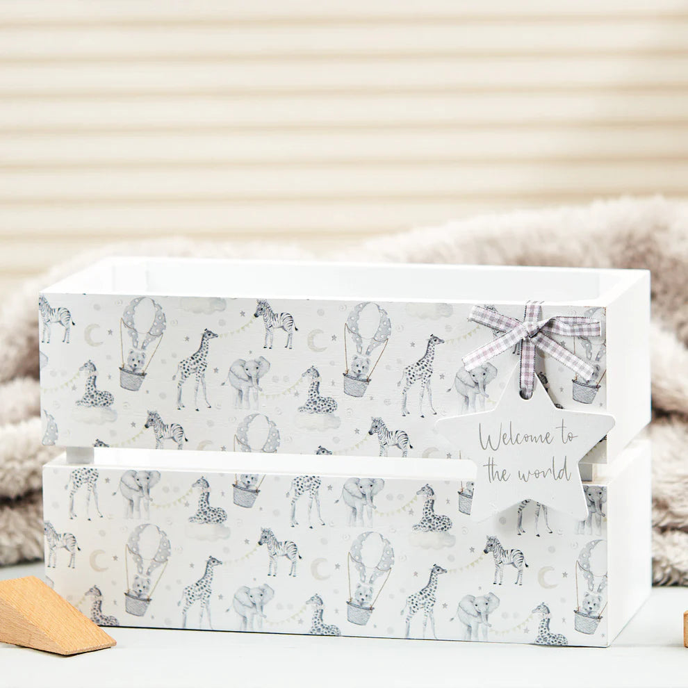 A white wooden nursery storage crate with grey animal and balloon print