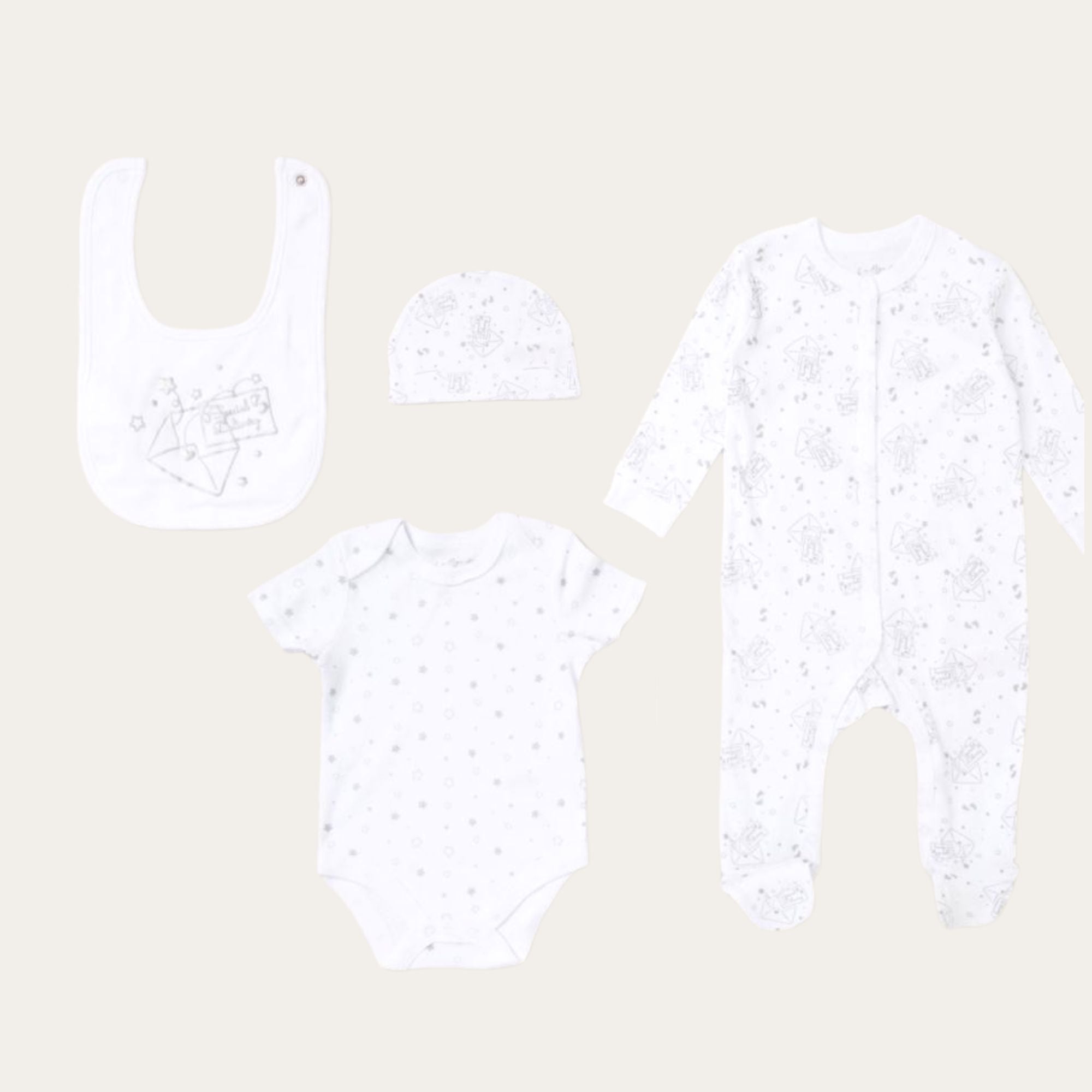 white baby clothing gifts set which reads special deliver. Five piece clothing set 