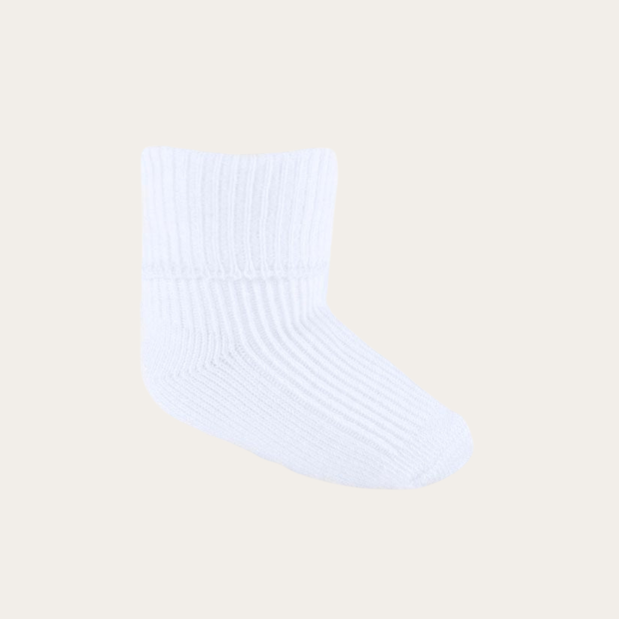 Soft white baby socks with a plain turnover cuff, designed for 0-3 months, perfect for keeping tiny feet cosy and stylish