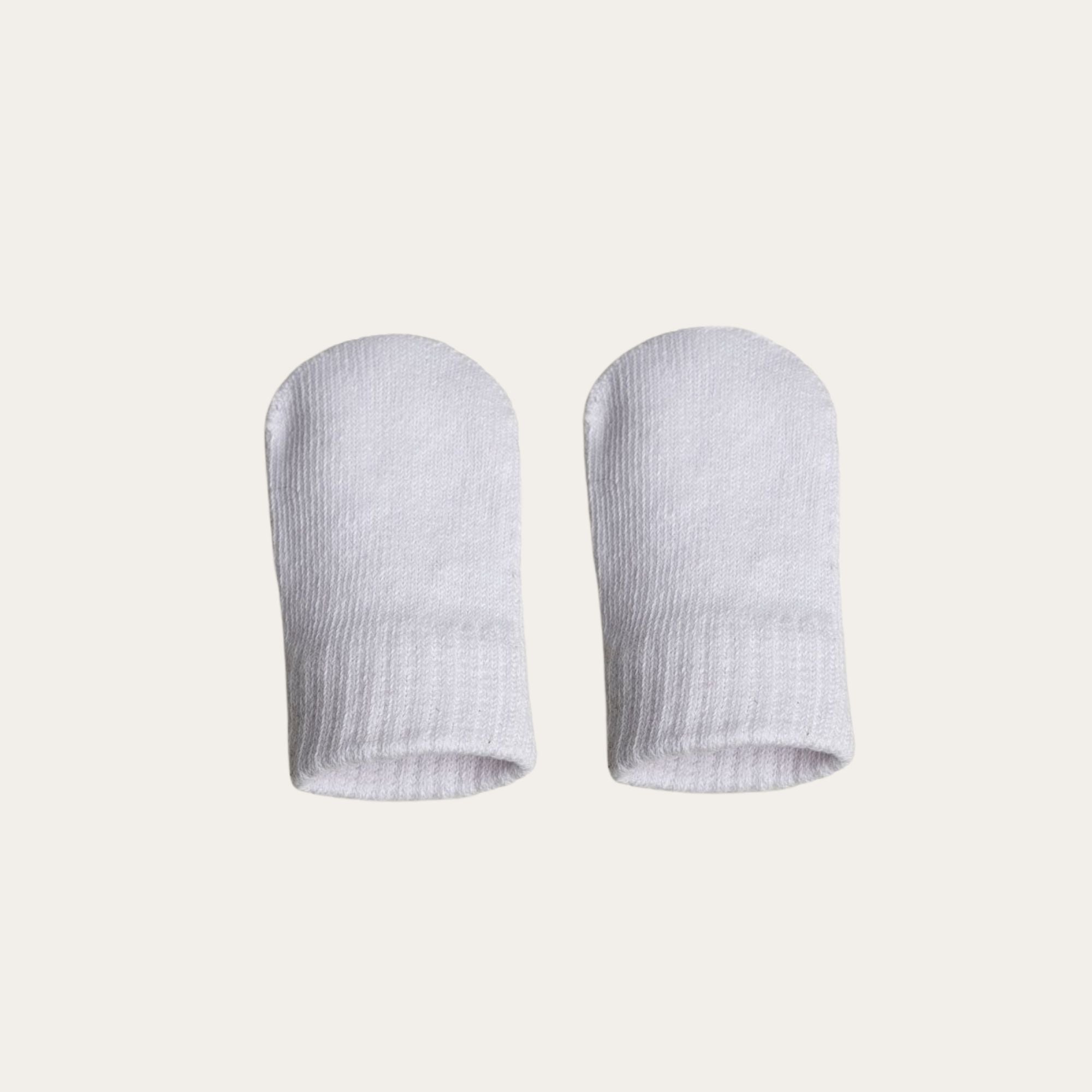 A pair of 100% brushed cotton mittens in white